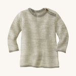 Disana organic merino wool melange jumper in a grey colour on a cream background.