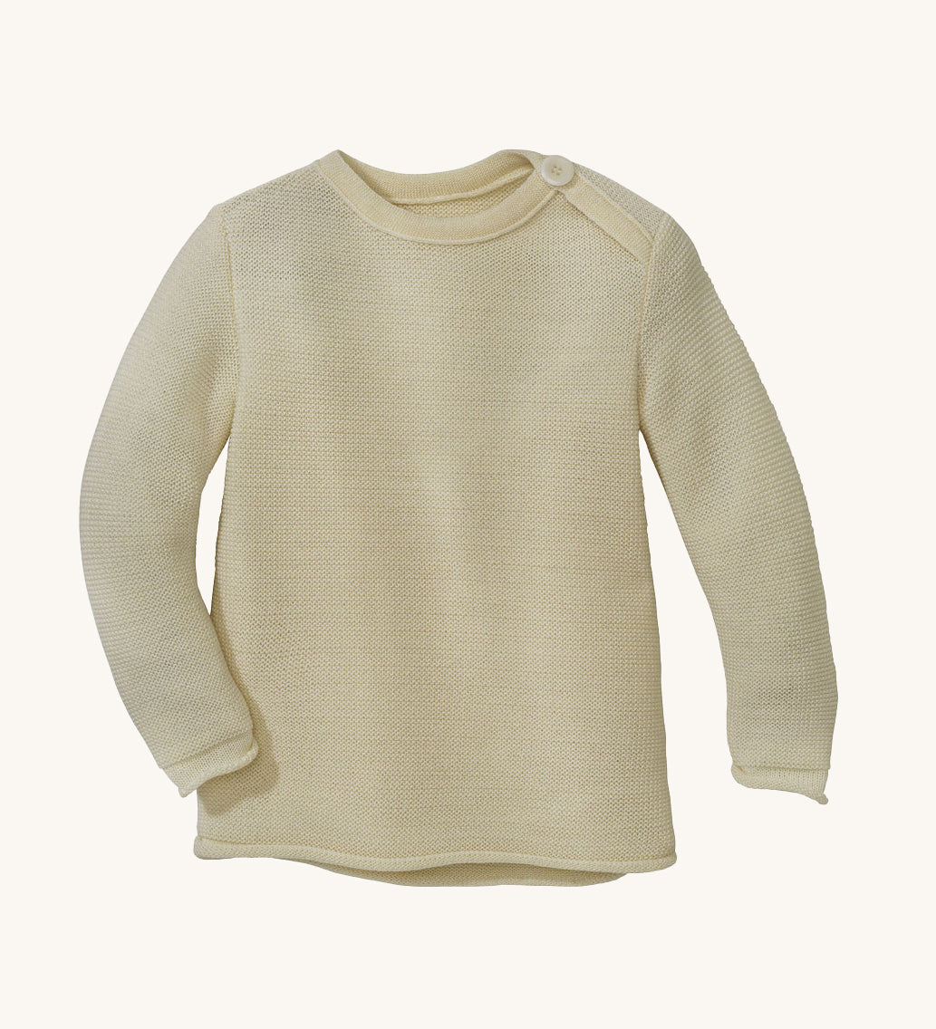 Disana organic merino wool melange jumper in a natural colour on a cream background.