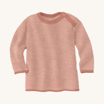 Disana organic merino wool melange jumper in a light pink colour on a cream background.