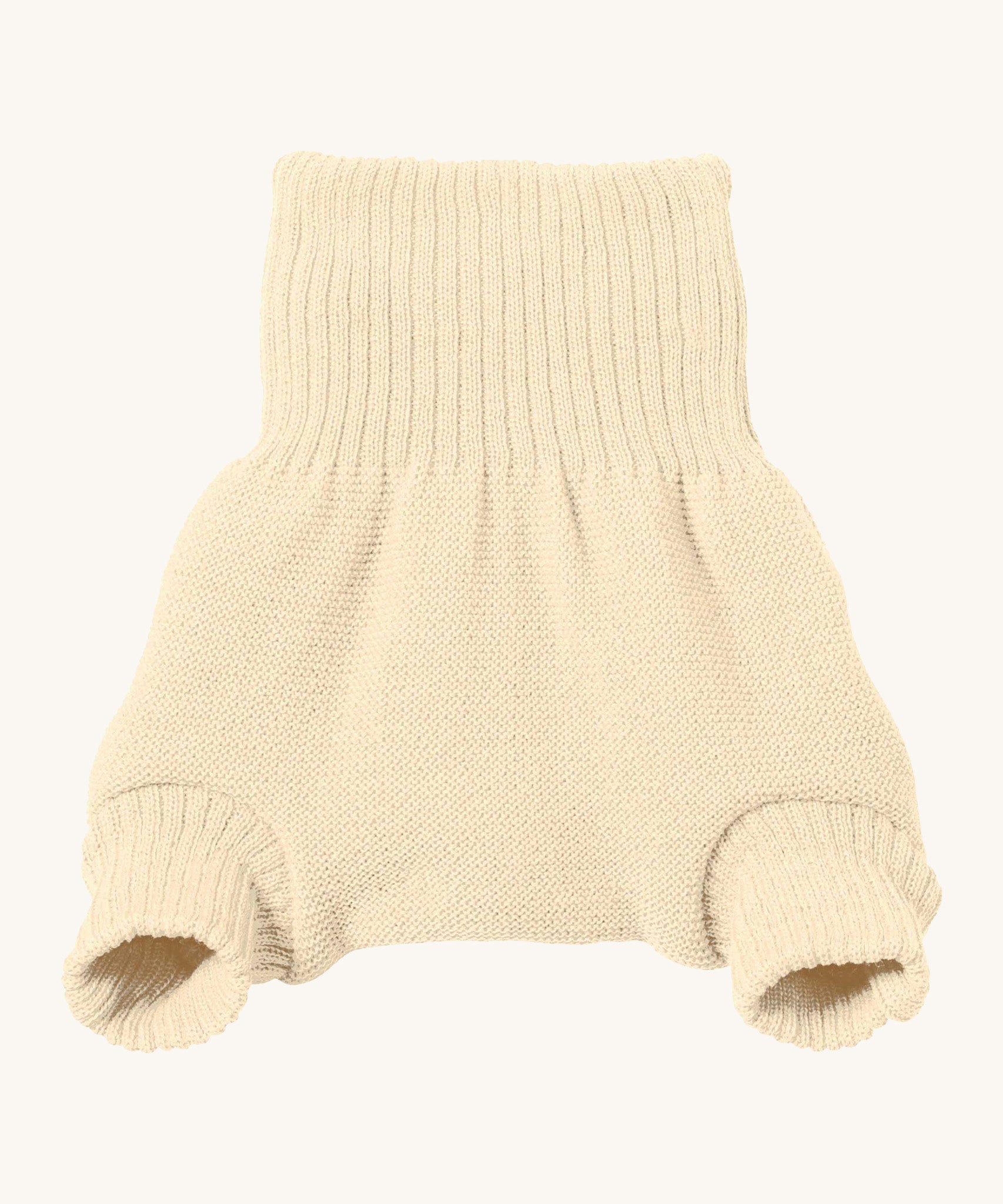 Disana merino wool nappy cover in natural on a cream background.