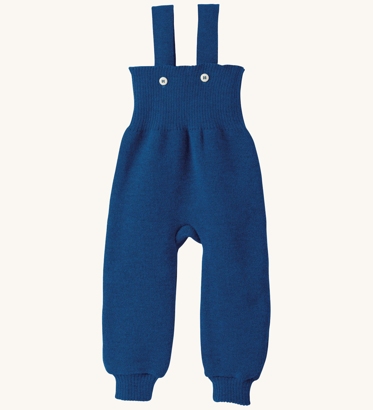 Disana organic merino wool dungarees in navy on a cream background.