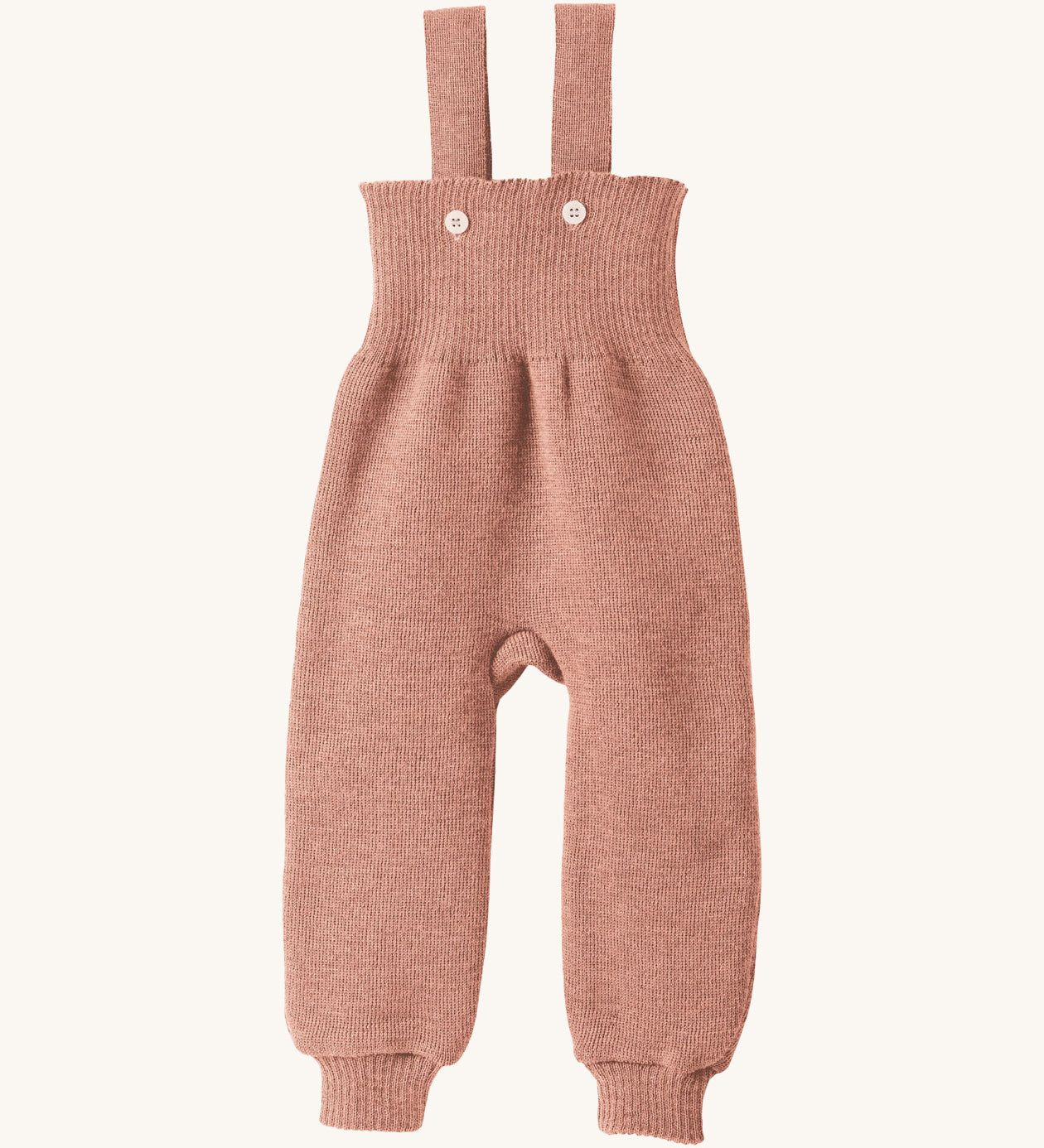 Disana organic merino wool dungarees in rose on a cream background.