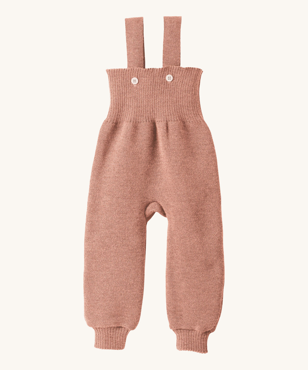 Disana organic merino wool dungarees in rose on a cream background.