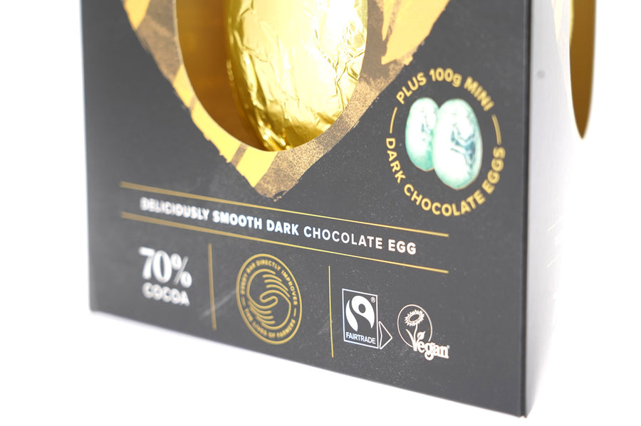 Close up of the Fairtrade and Vegan certifications on the side of the Divine dark chocolate Easter egg