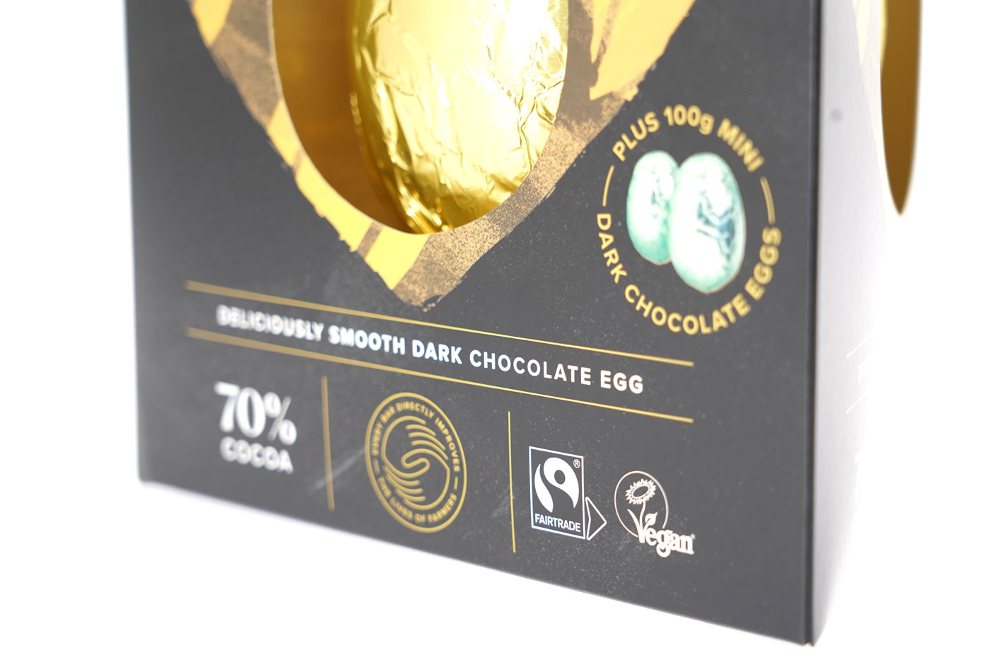 Close up of the Fairtrade and Vegan certifications on the side of the Divine dark chocolate Easter egg