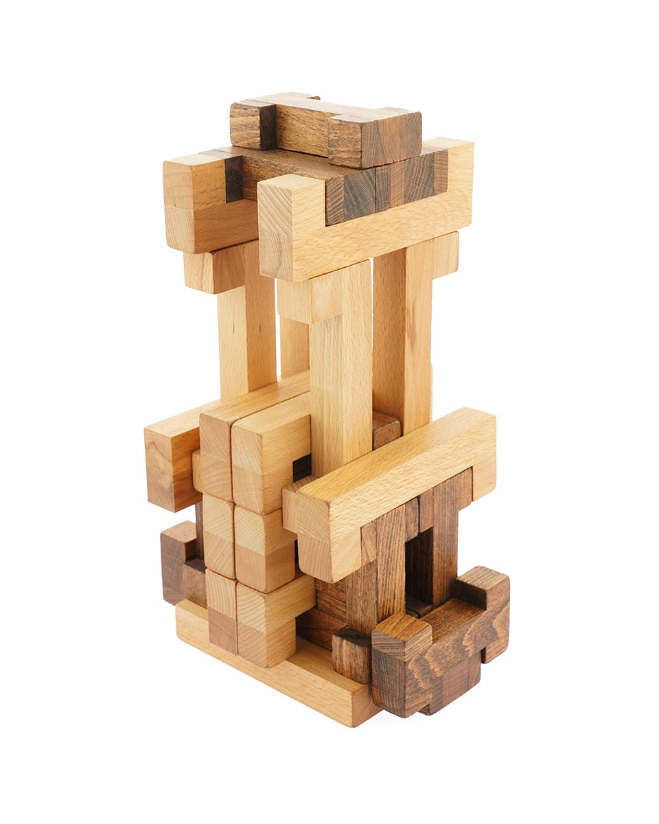 Drei Blätter sustainably sourced wooden shape set stacked in a geometric tower on a white background