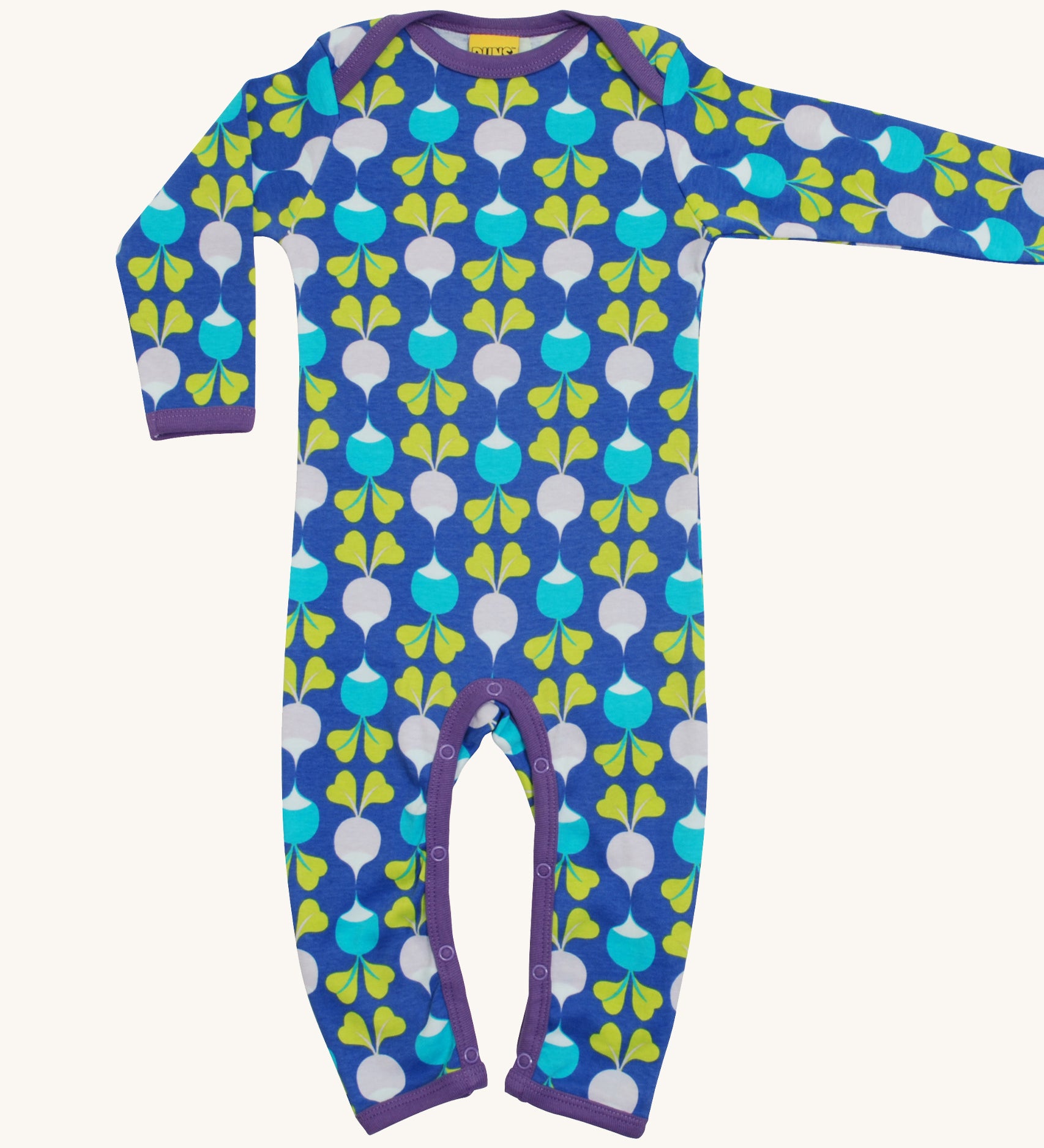 A light blue Duns babygrow with a light blue and light purple radish design on a cream background