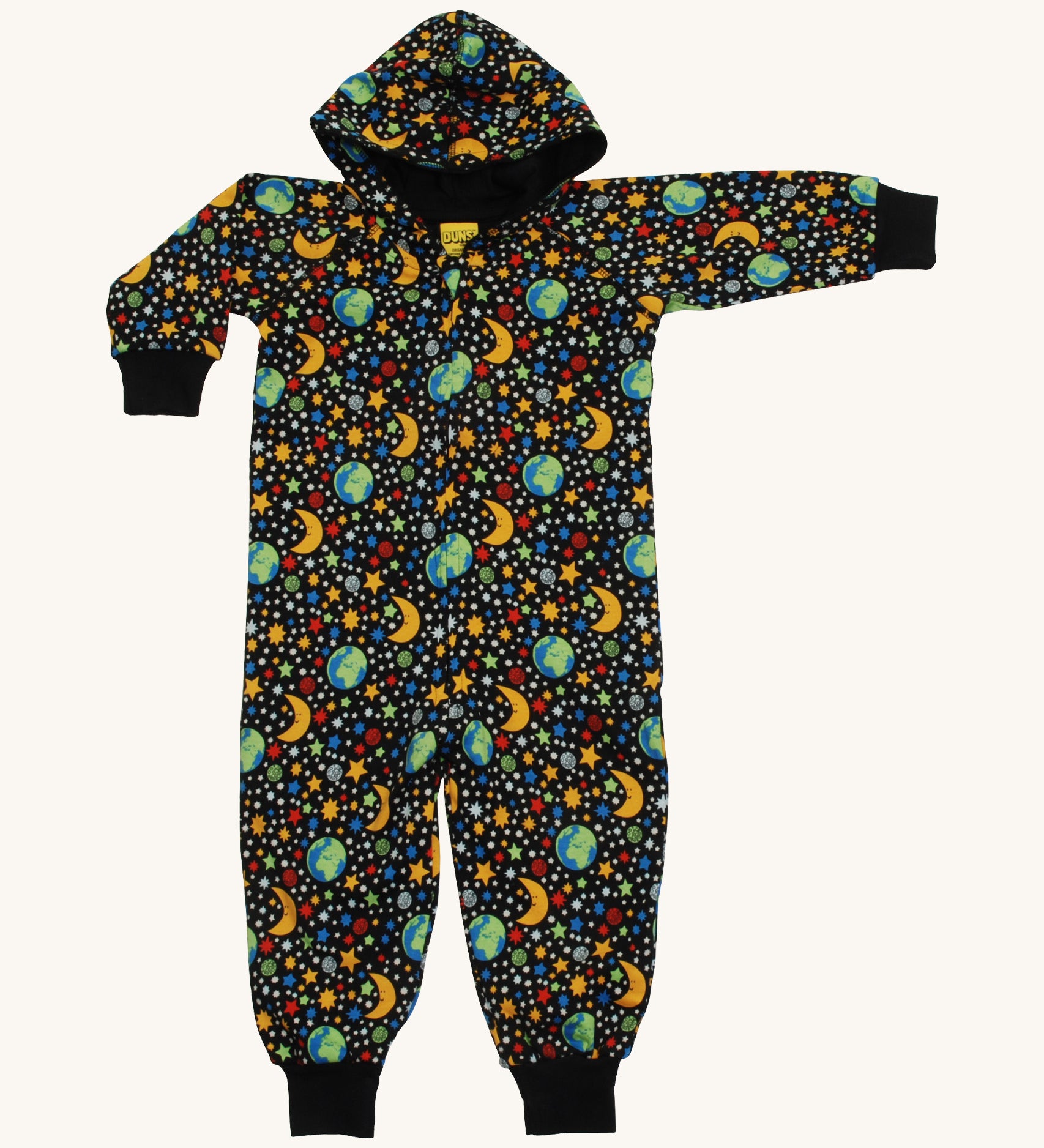 A black Duns hooded onesie with the earth, the moon and stars design on a cream background