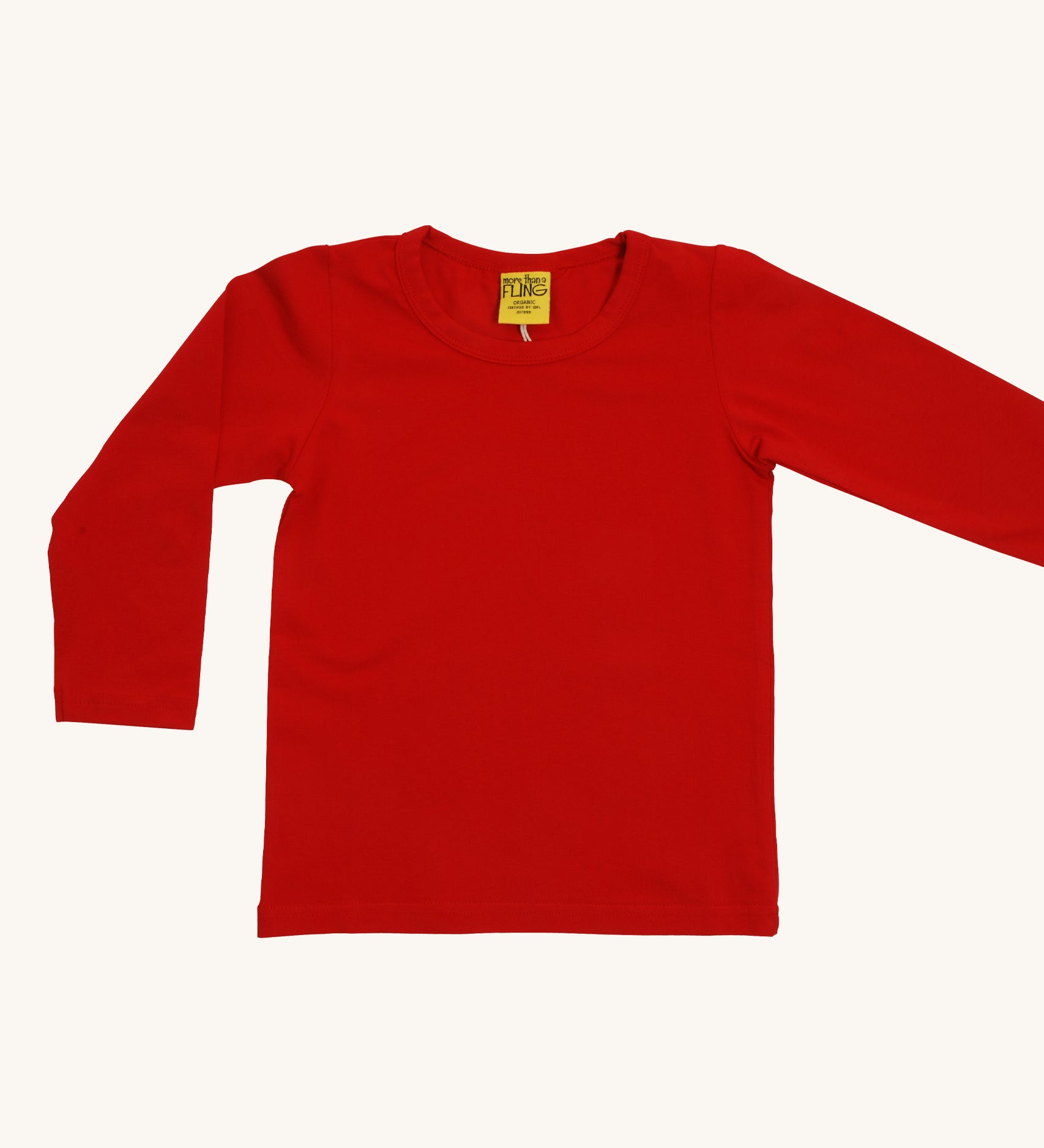 A red Duns long sleeve top on a cream background.