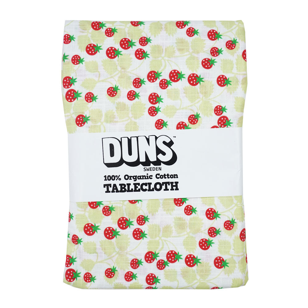 DUNS Sweden organic cotton tablecloth in the wild strawberries paradise green print on a white background