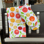 citrus and cultivation tea towels hanging from an over handle