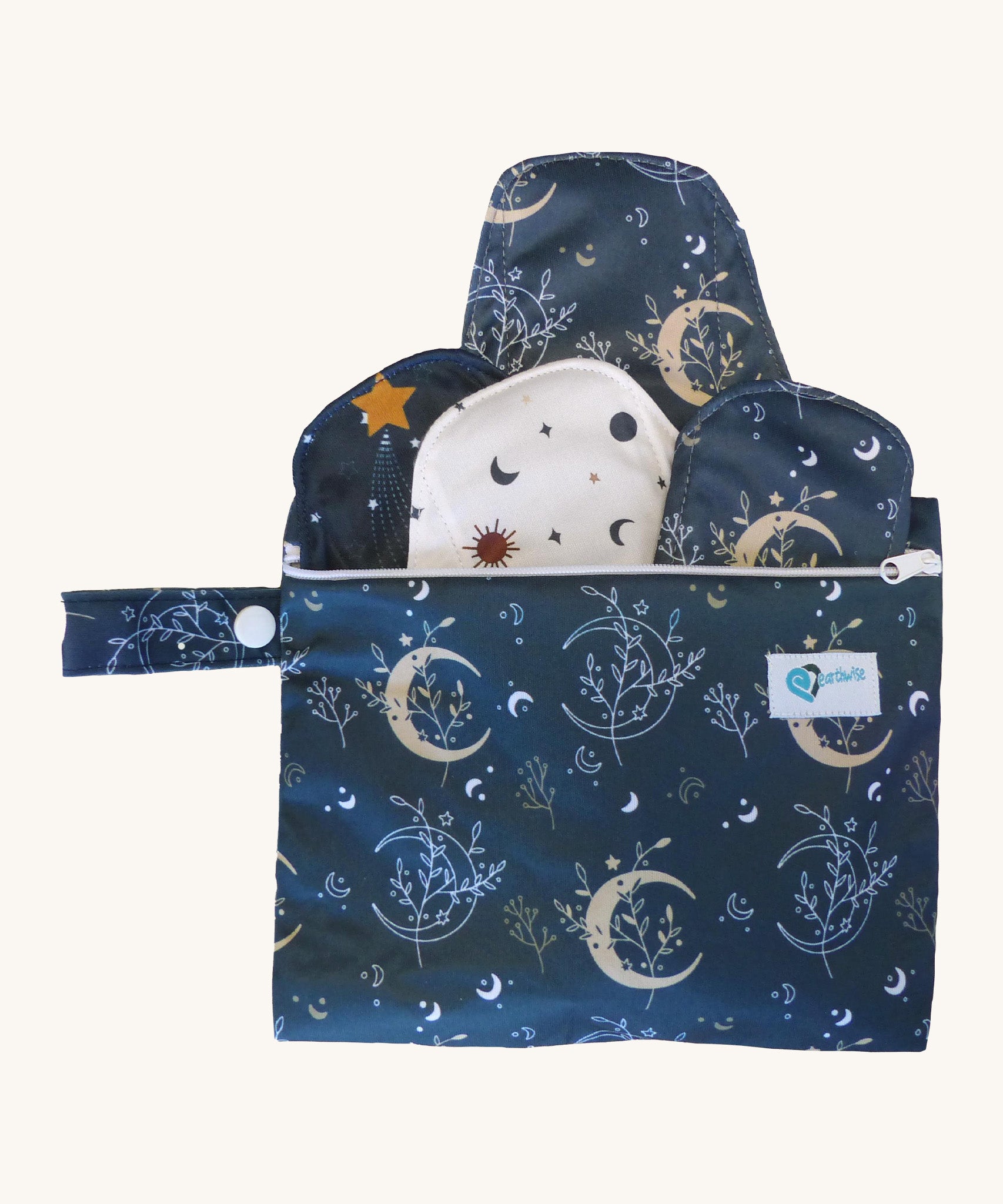 Earthwise starter kit includes 4 reusable period pads and a coordinating mini wet bag purse in Celestial print.