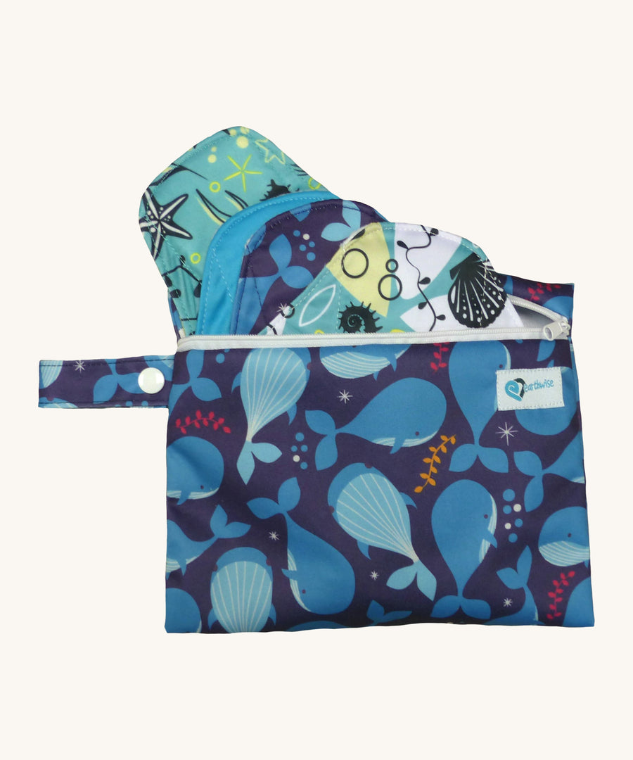 Earthwise starter kit includes 4 reusable period pads and a coordinating mini wet bag purse in Under the sea print.