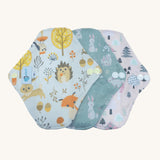 Three Earthwise reusable period pads in cute woodland prints.