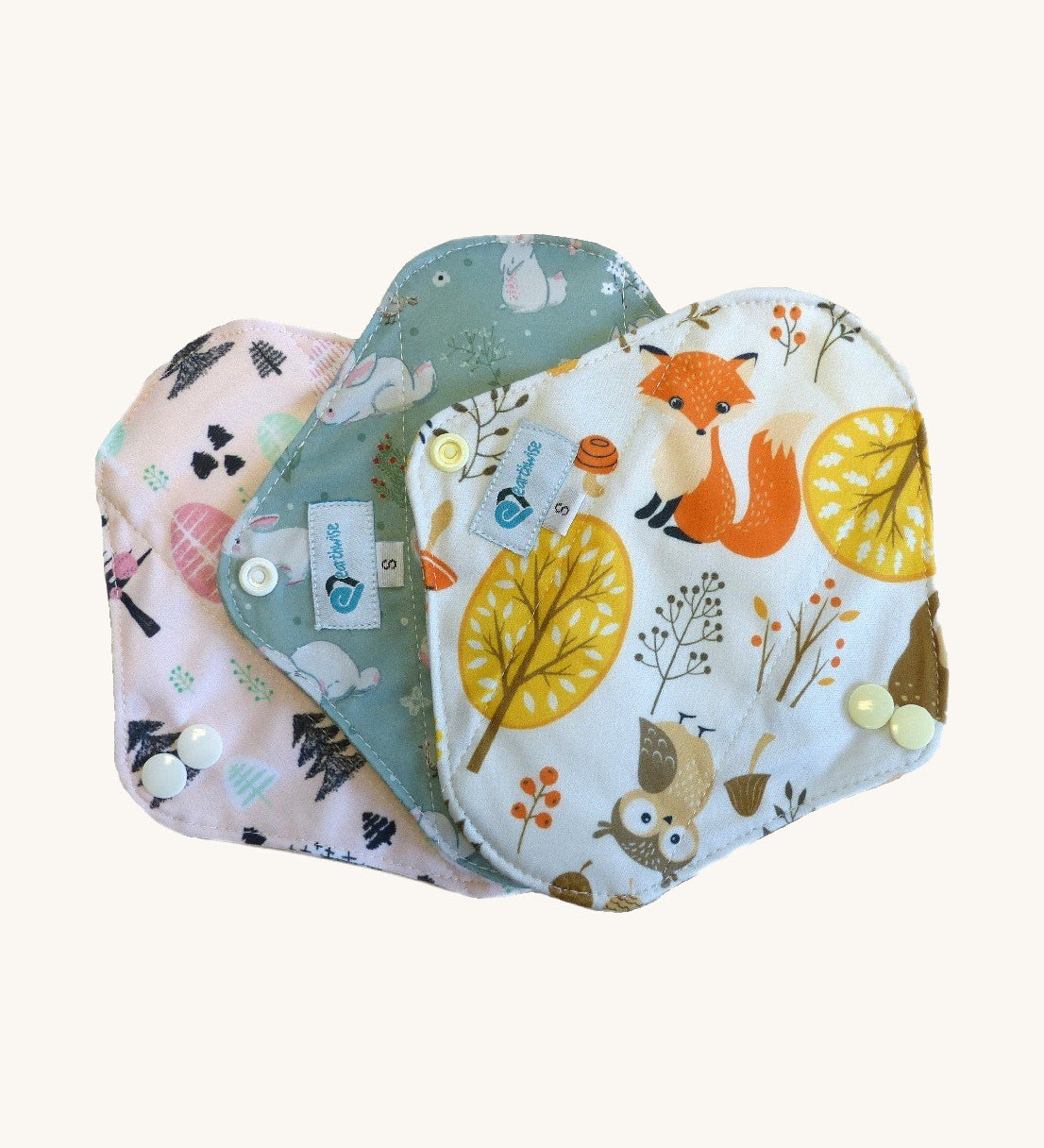 Three Earthwise Panty Liners in cute woodland prints.