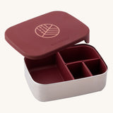 Eco Rascals Stainless Steel Lunch Box with a burgundy lid and pots on a plain background.