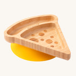 The Eco Rascals Pizza shamed Bamboo Plate with yellow silicone suction on a plain background. 