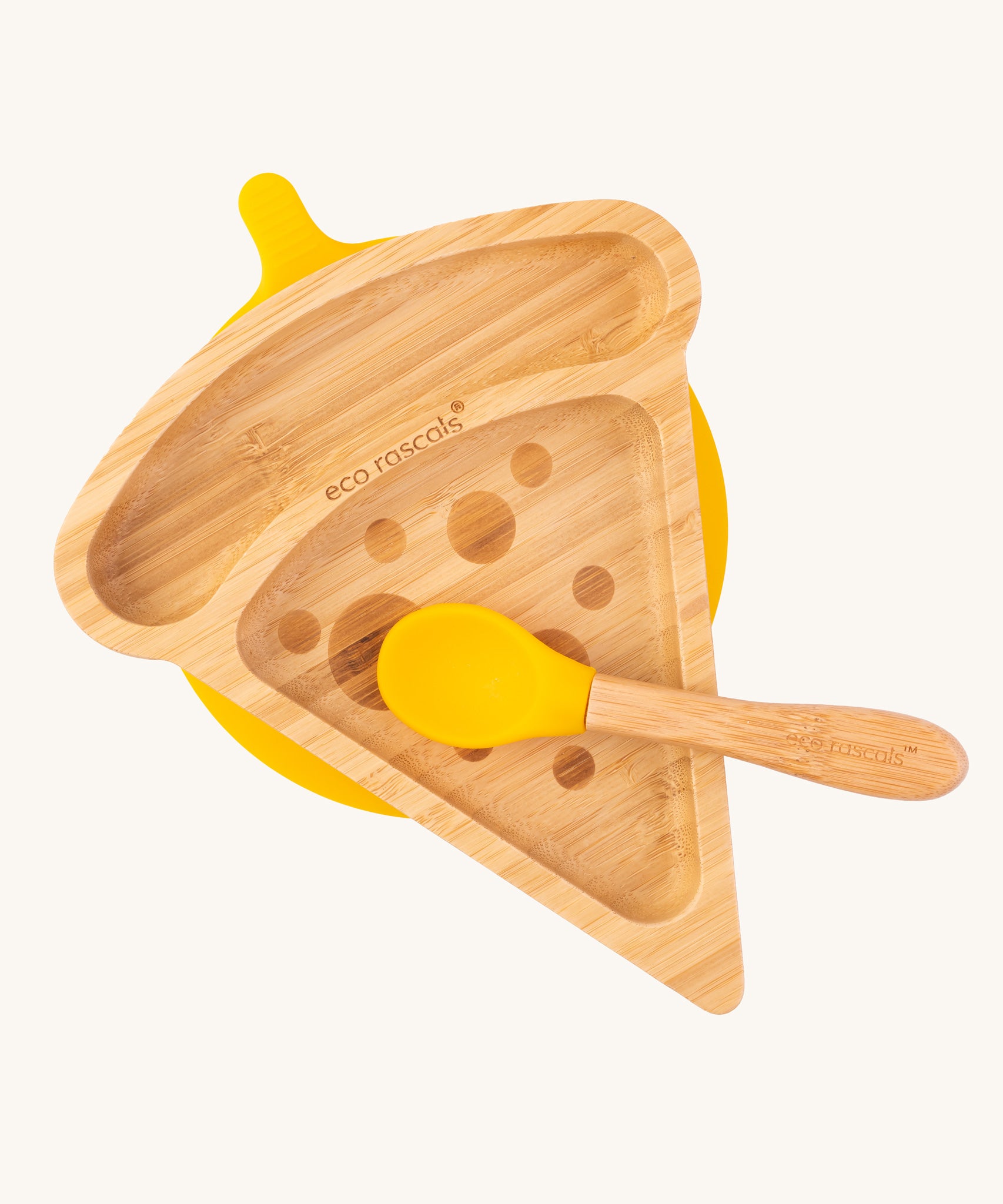 An overhead view of the Eco Rascals Pizza Bamboo Suction Plate and a matching yellow bamboo spoon on top on a plain background. The spoon is sold separately 