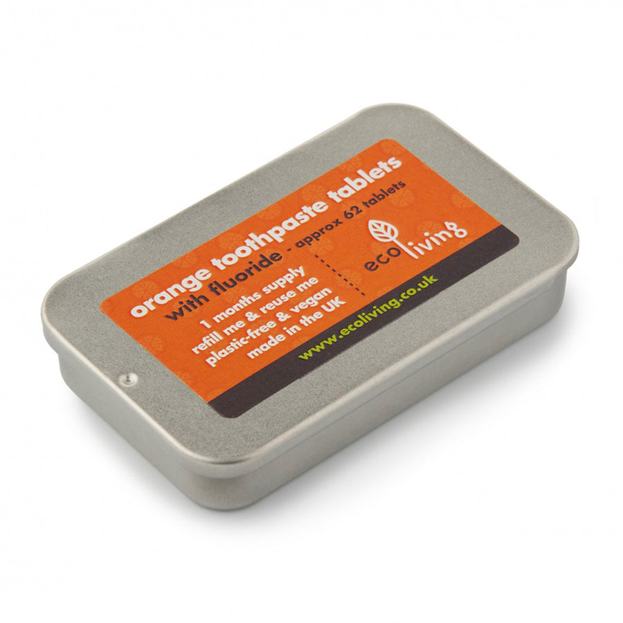 Ecoliving orange flavoured flouride toothpaste tablets tin on a white background