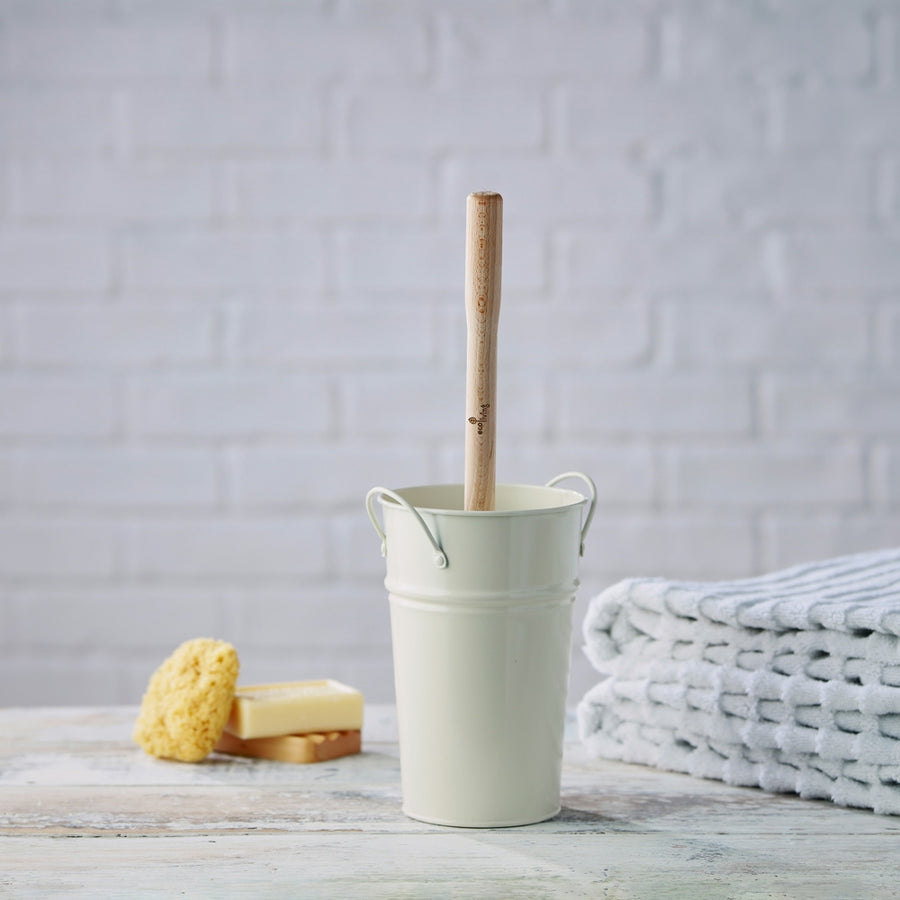 Ecoliving Small Wooden Toilet Brush pictured in a cream metal holder