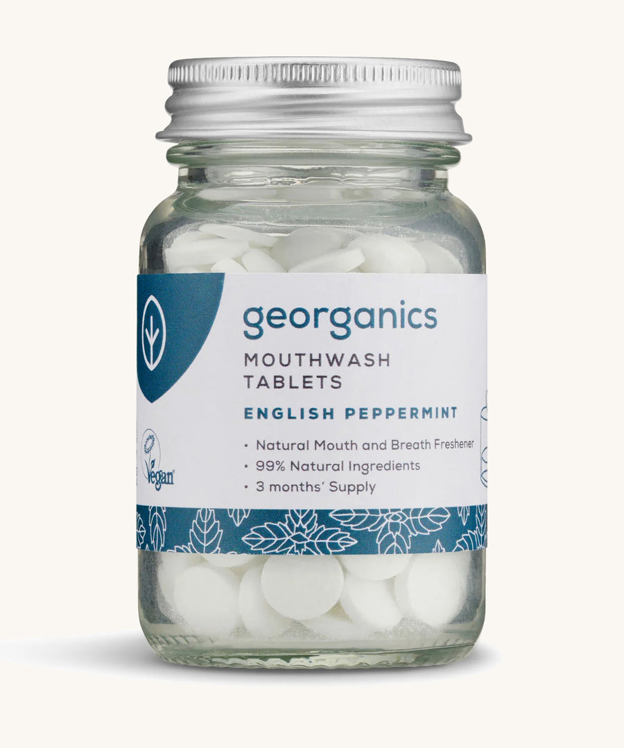 Georganics Mouthwash Peppermint tablets pictured on a cream backgorund