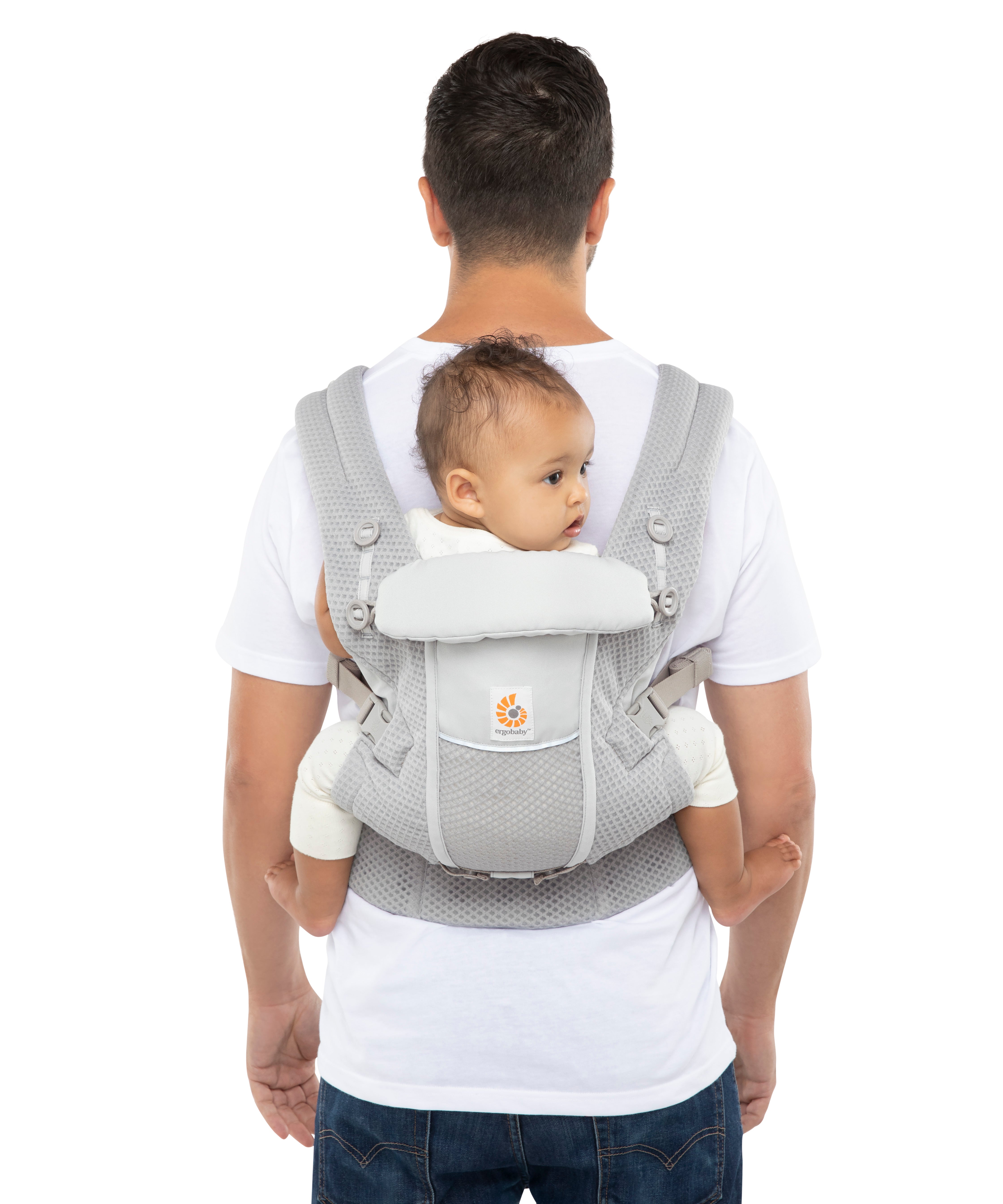 Man with short brown hair and a white t-shirt wearing a baby on his back in the Ergobaby Adapt  SoftFlex™ Mesh Baby Carrier in Pearl Grey. Back view, white background. 