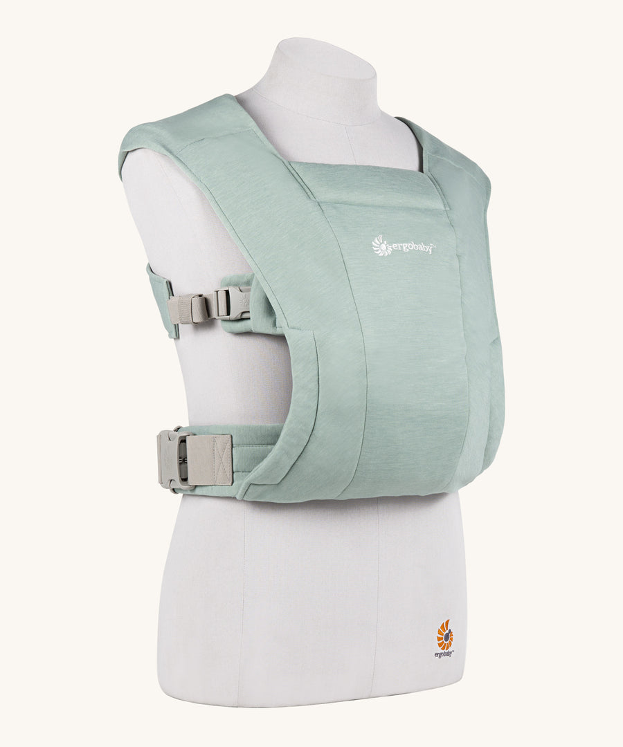 Ergobaby Embrace Soft Knit Newborn Baby Carrier in Jade. Side view on a mannequin.