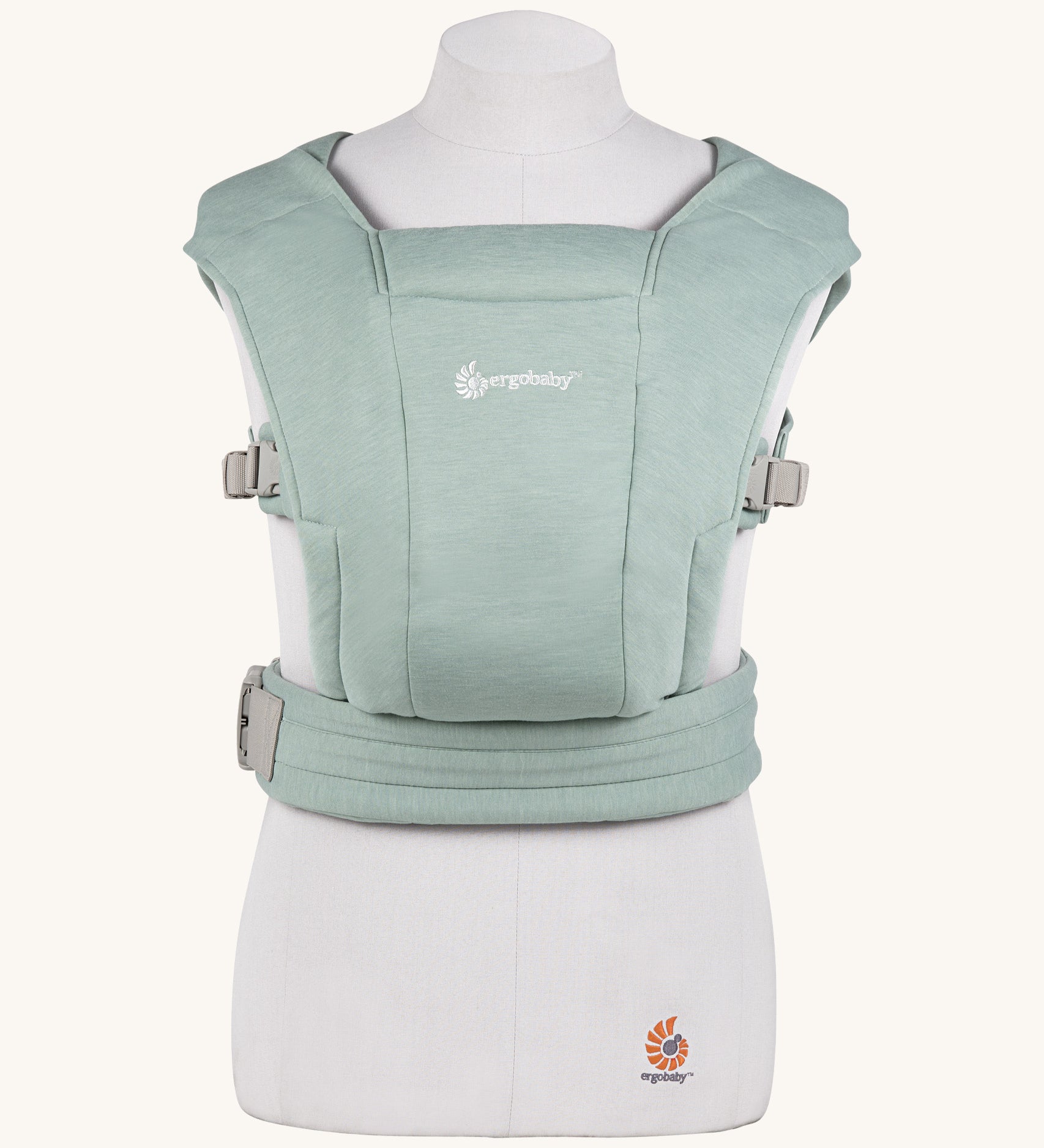 Ergobaby Embrace Soft Knit Newborn Baby Carrier in Jade. Front view on a mannequin.