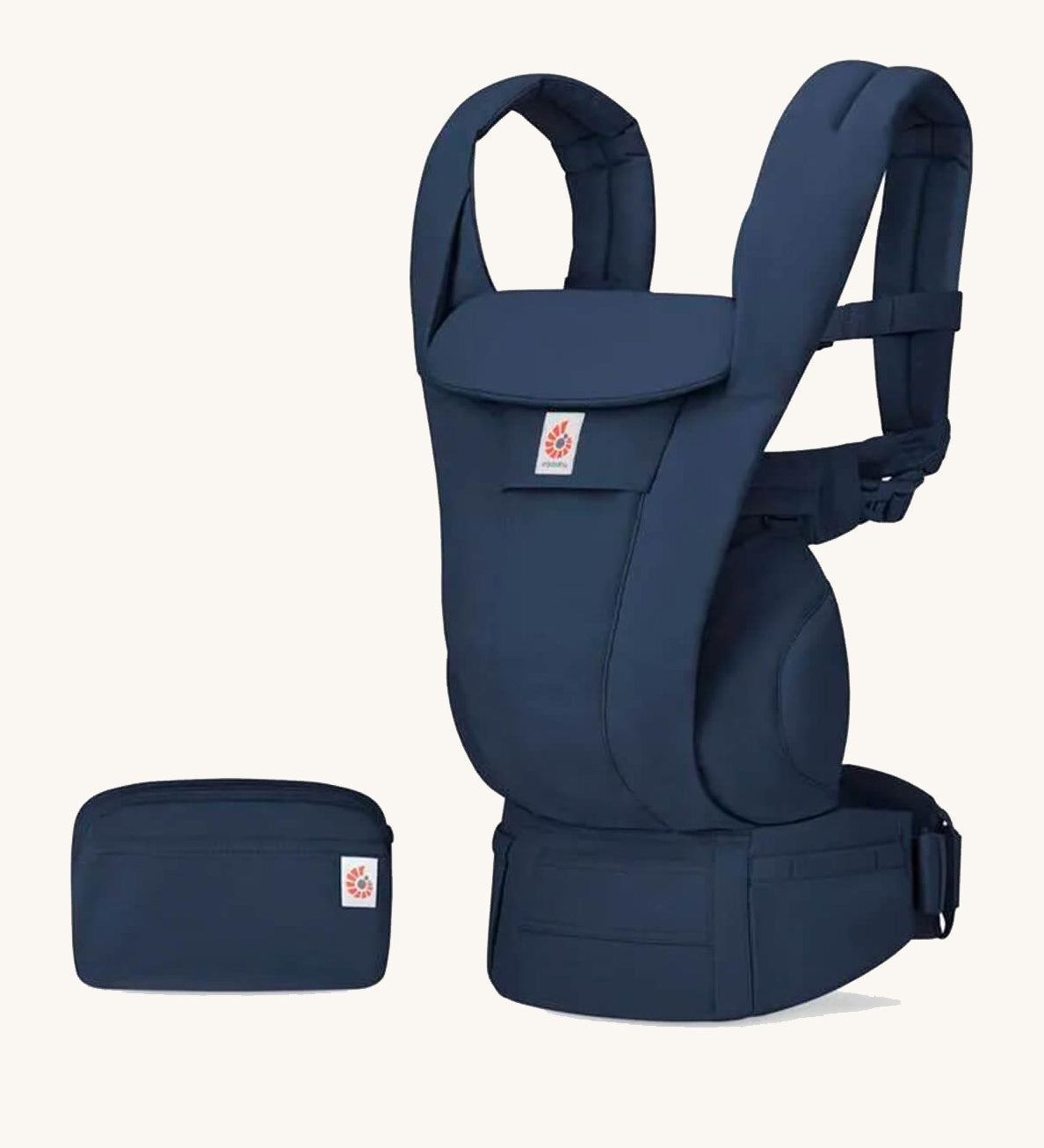 The Ergobaby Omni Deluxe Cotton baby carrier in Midnight Blue, with a handy storage purse that can attach to the carrier.