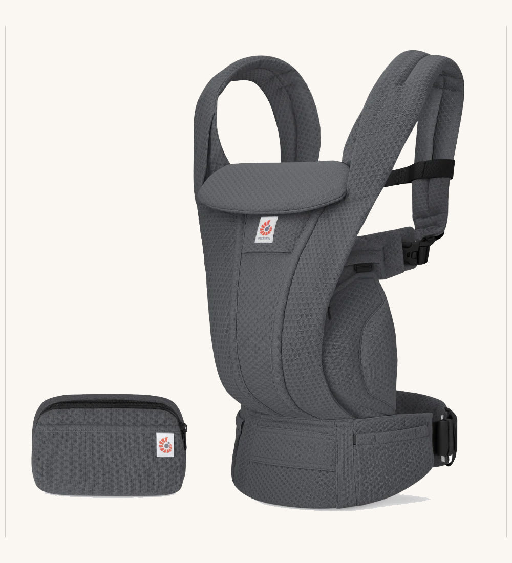 The Ergobaby Omni Deluxe Mesh baby carrier in Graphite Grey, with a handy detachable storage bag.