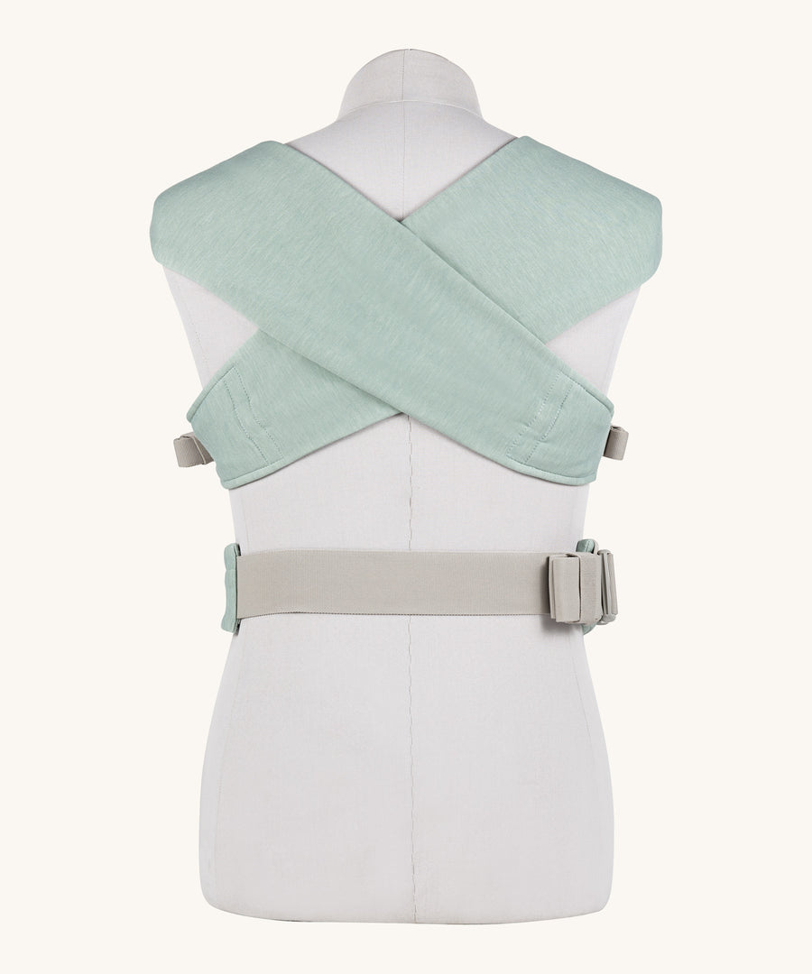 Ergobaby Embrace Soft Knit Newborn Baby Carrier in Jade. Back view showing cross over straps on a mannequin.