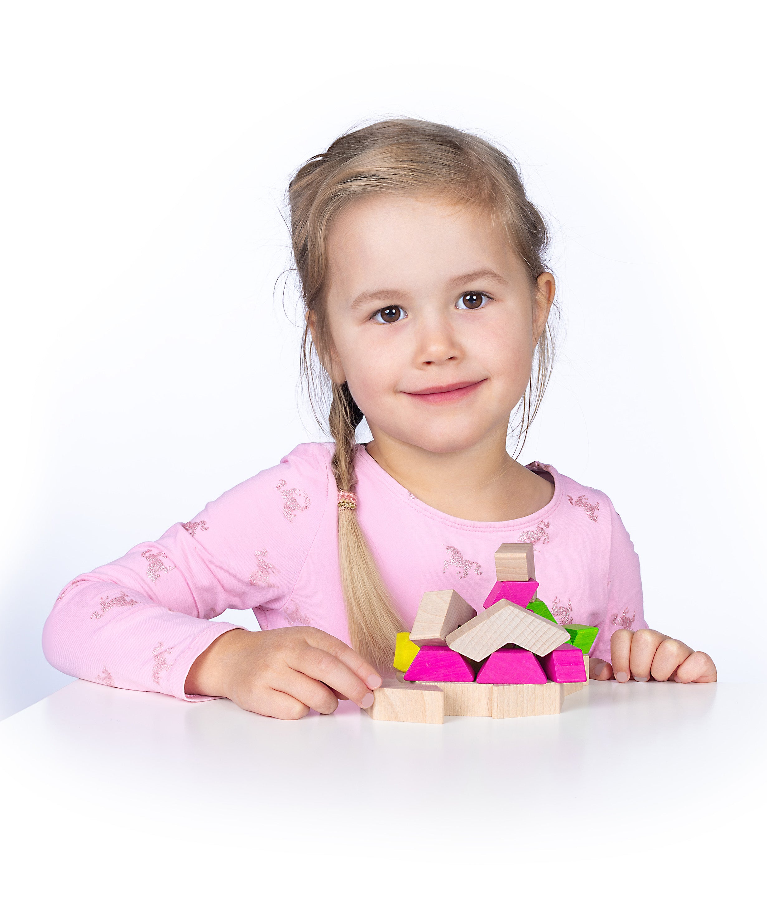 Erzi wooden geo building block set in played by a child 