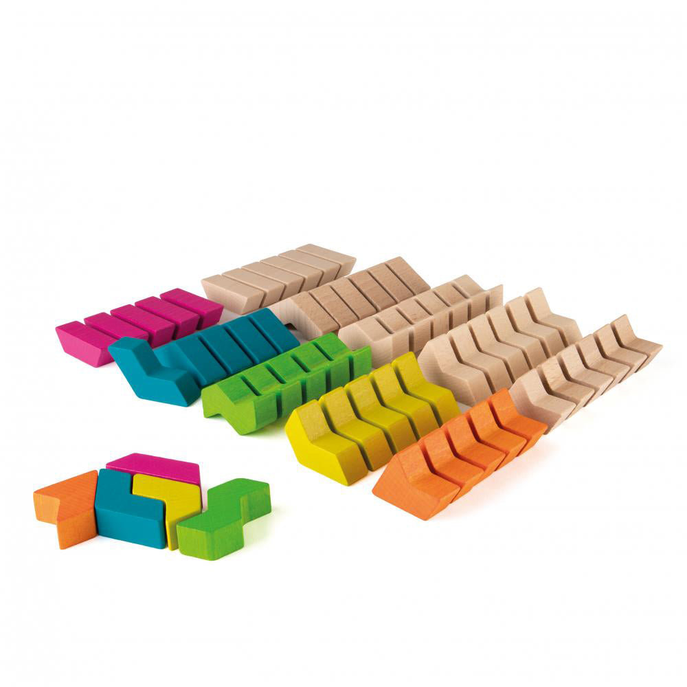 Pieces of the Erzi maximix stacking shape building set on a white background