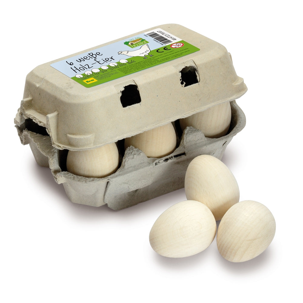 Erzi Six White Eggs Wooden Play Food in a cardboar egg box