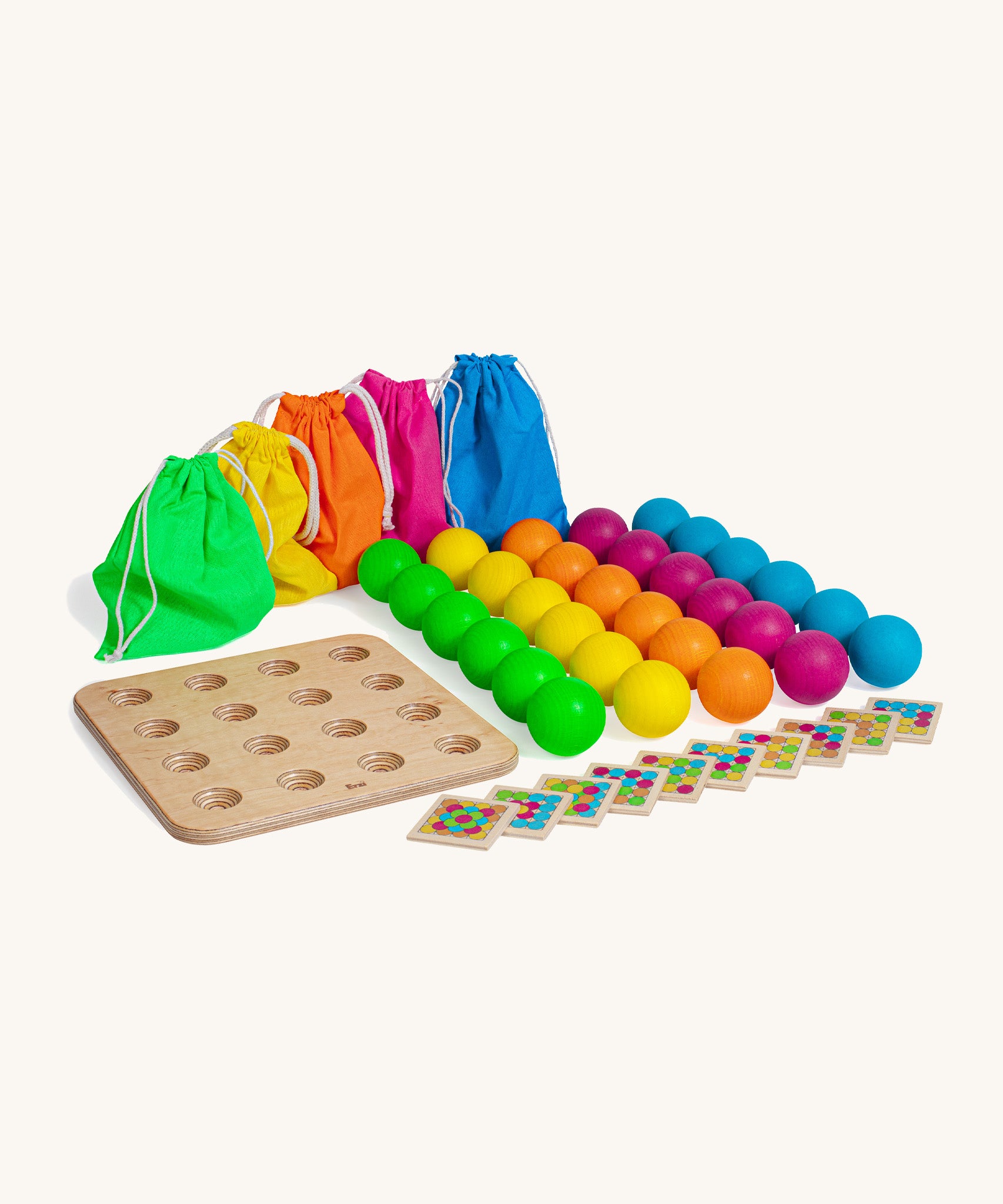 Erzi wooden multicoloured balls stacking game full set on a cream background