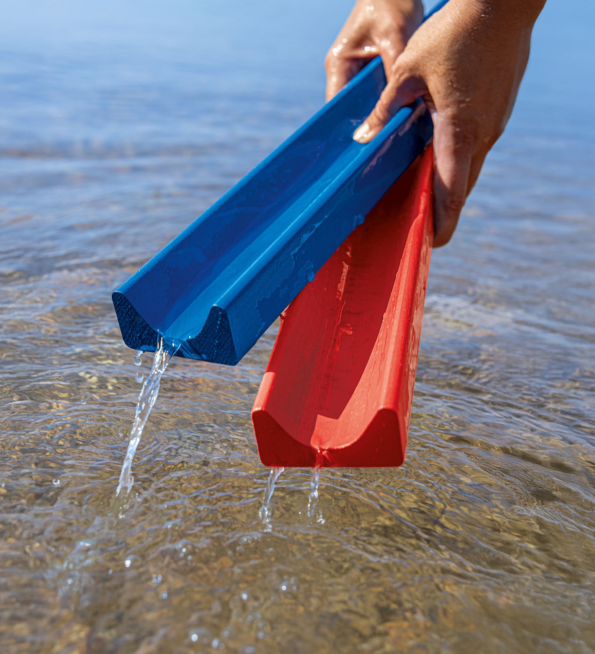 Erzi wooden water and marble run pieces in water