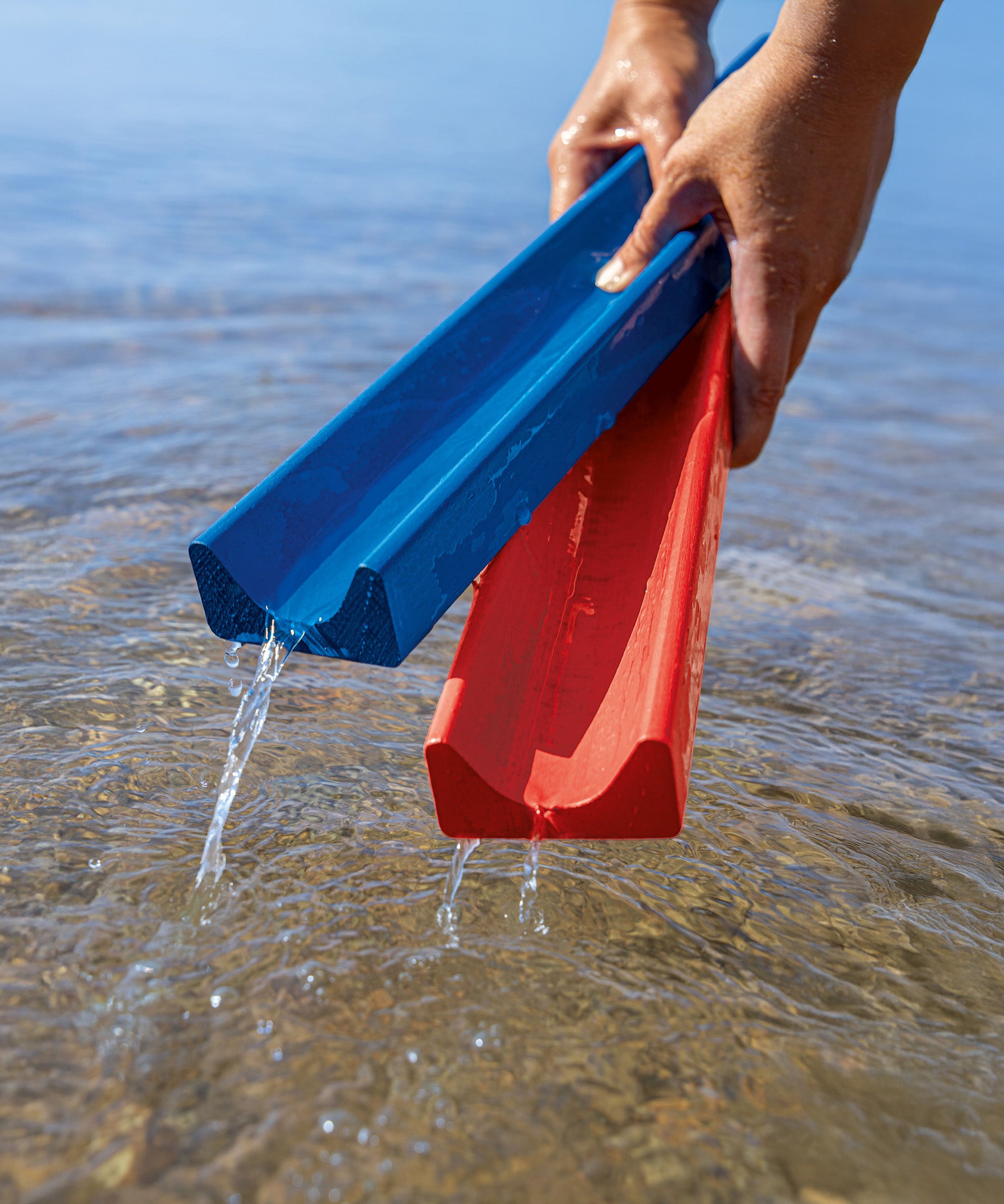 Erzi wooden water and marble run pieces in water