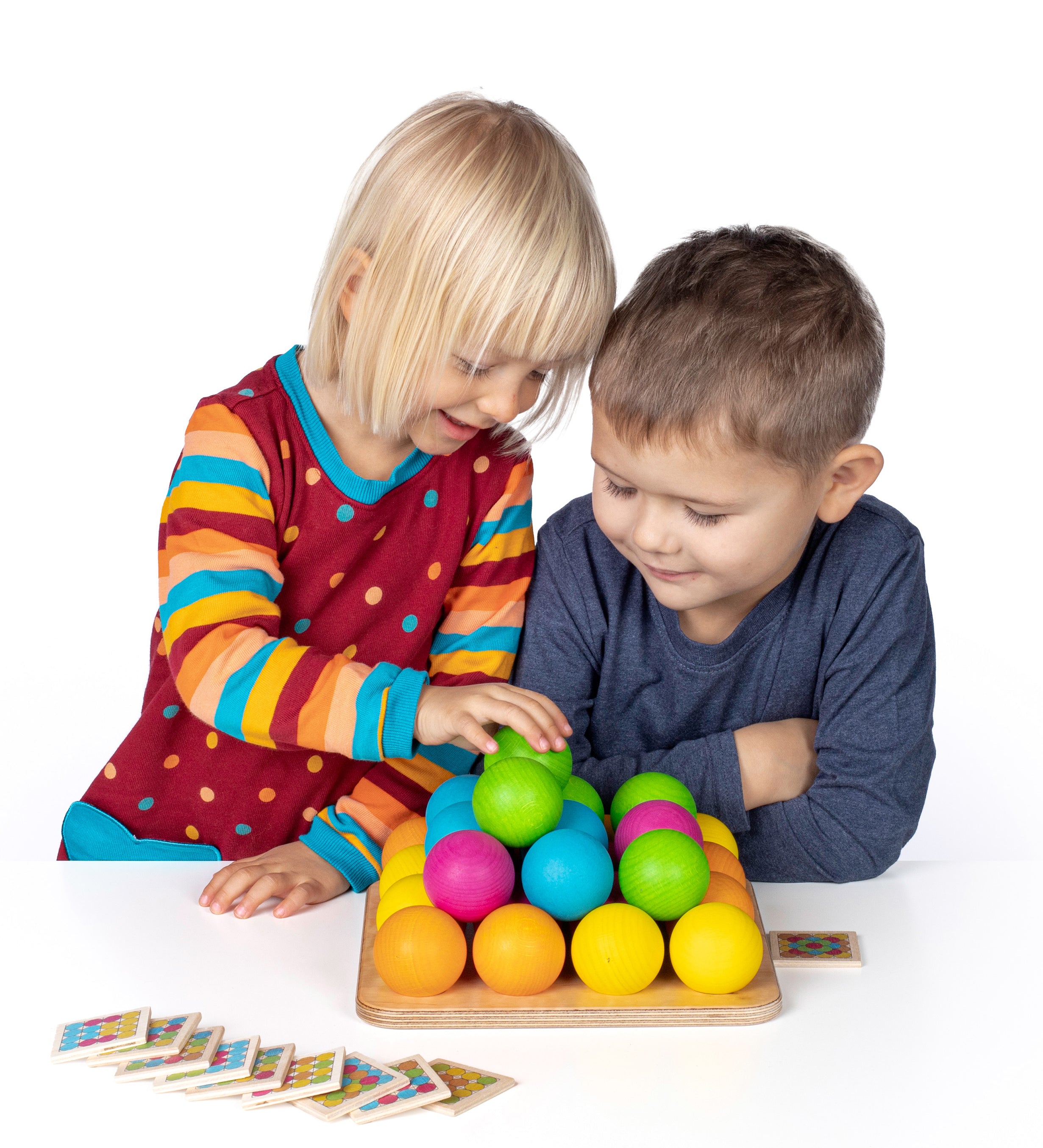 Erzi wooden multicoloured balls stacking game on a wooden base played with by 2 children