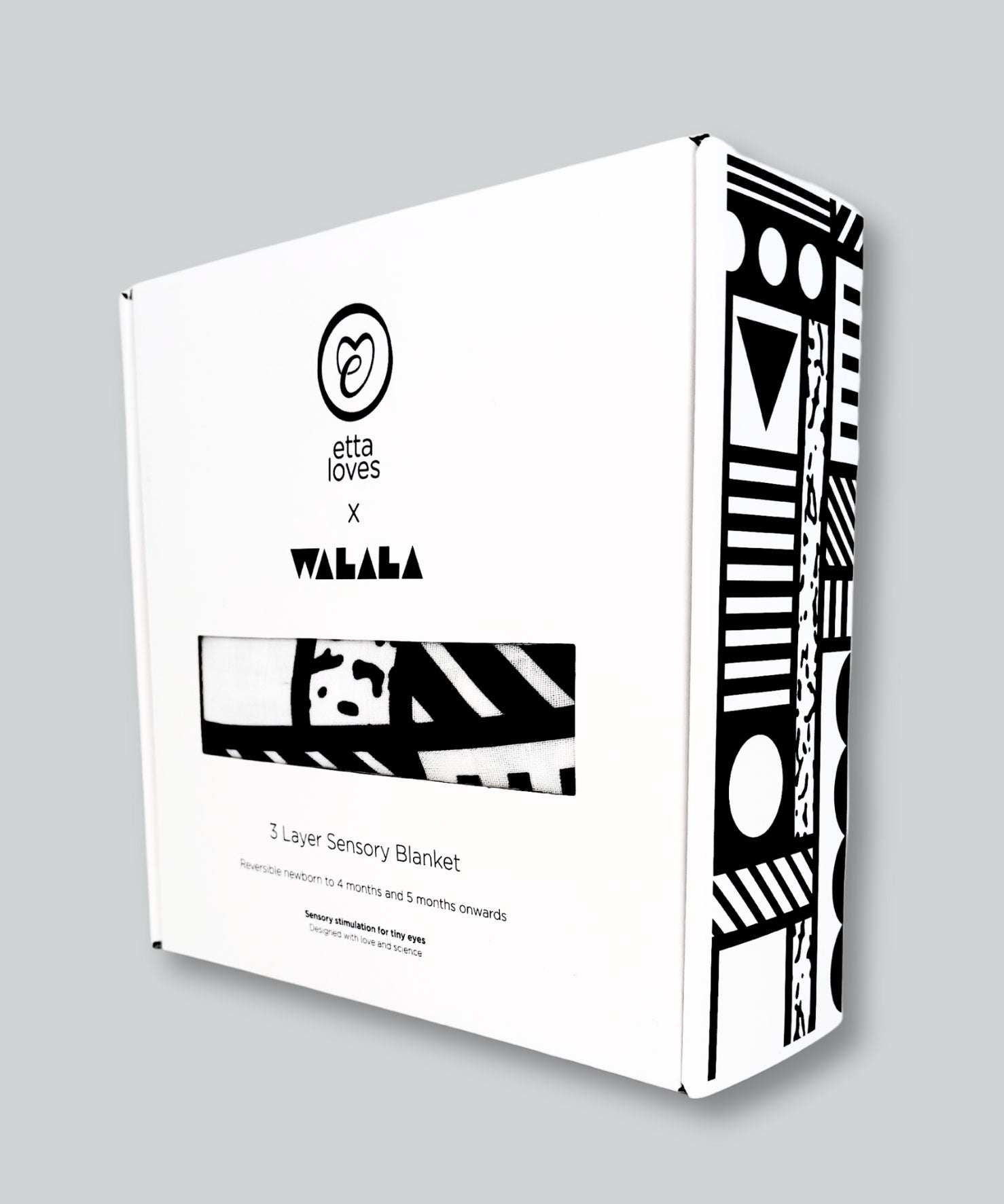 The Etta Loves x Camille Walala Muslin Blanket shown in it's box. 