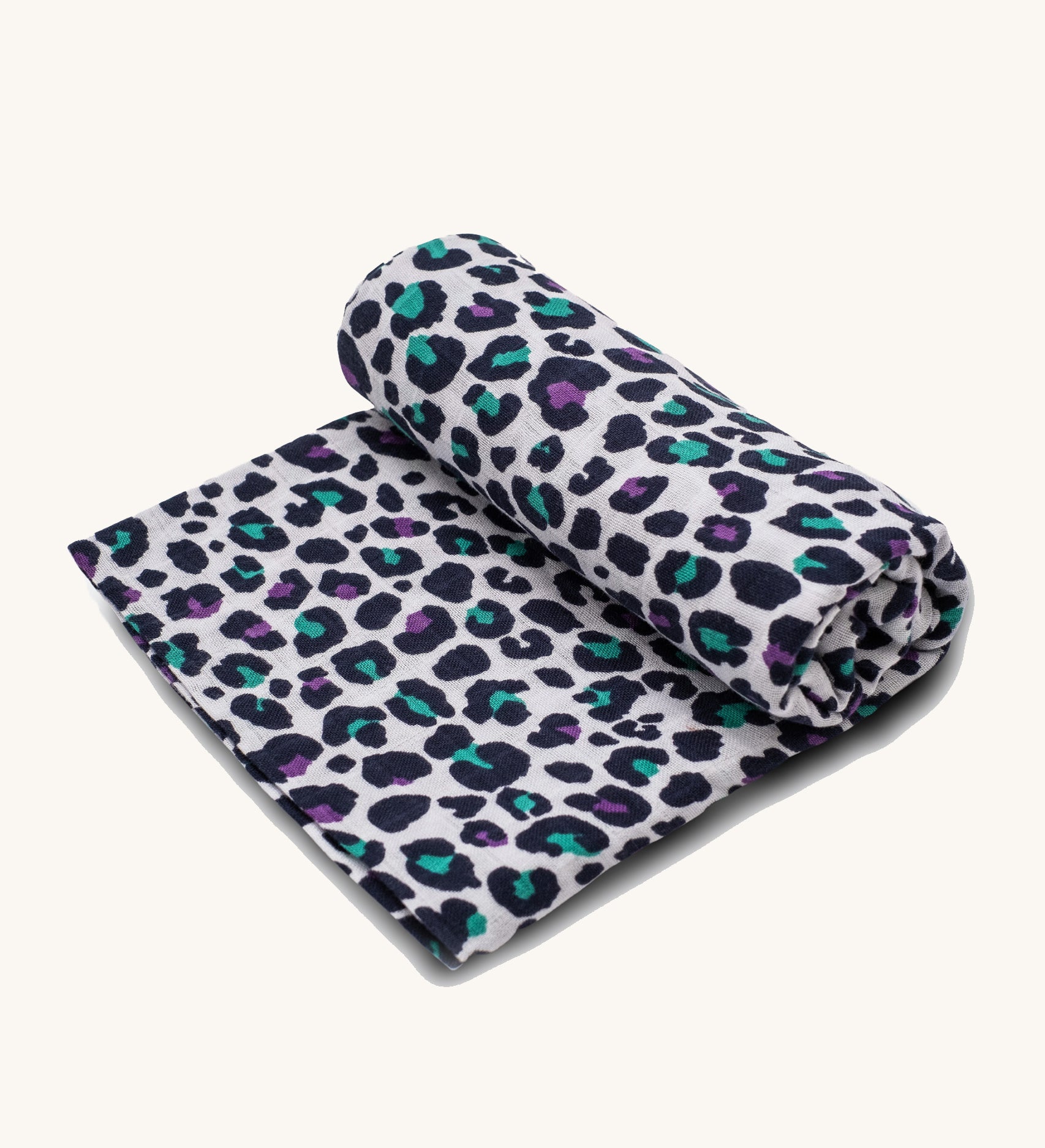 Etta Loves Extra Large Organic Cotton Baby Muslin Square - Purple Leopard. Made from GOTS Organic Cotton, with purple and green sports with a black outline, on a cream background