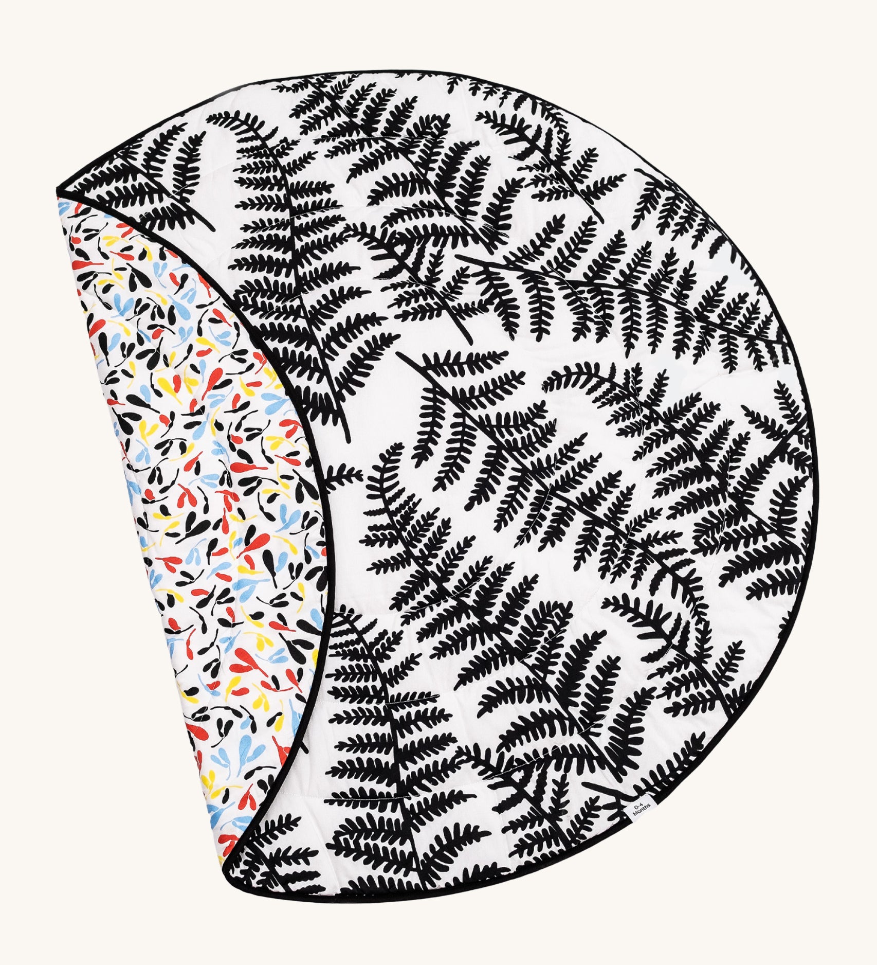 Etta Loves Reversible Organic Cotton Baby Play Mat - Plant Print with black and white Ferns on one side, and colourful Sycamore seeds print on the other