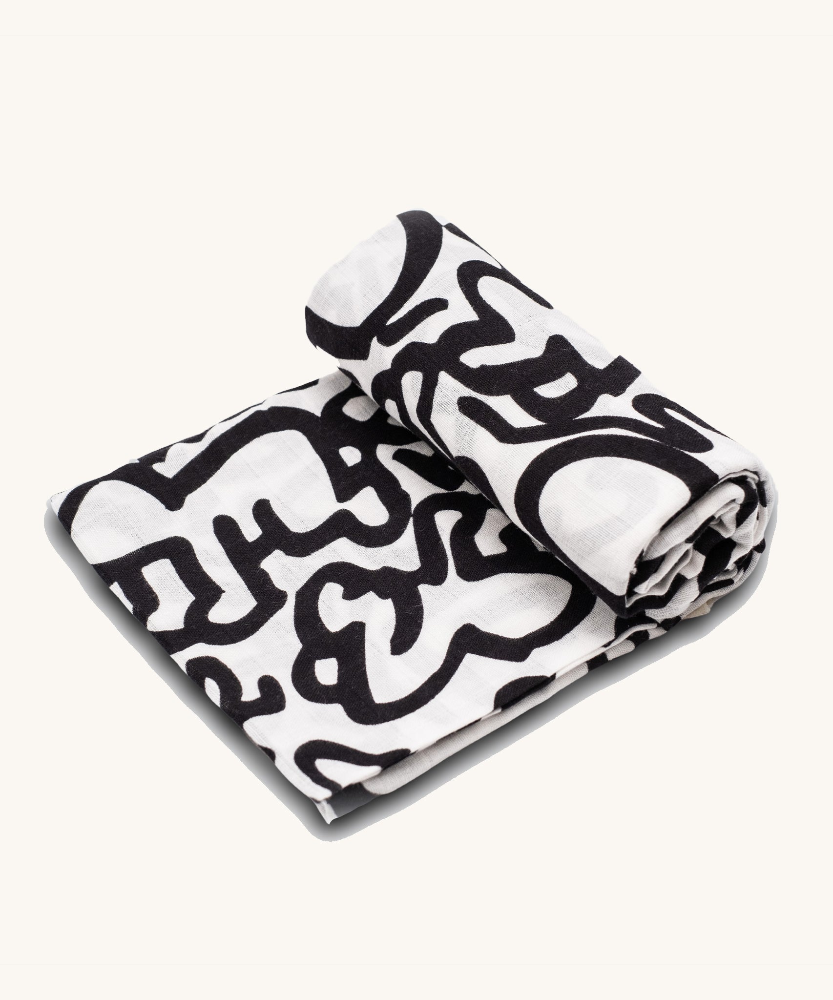 The Etta Loves X Keith Haring Extra Large Organic Cotton Baby Muslin Square - Baby, with a high-contrast black and white design crawling baby design 