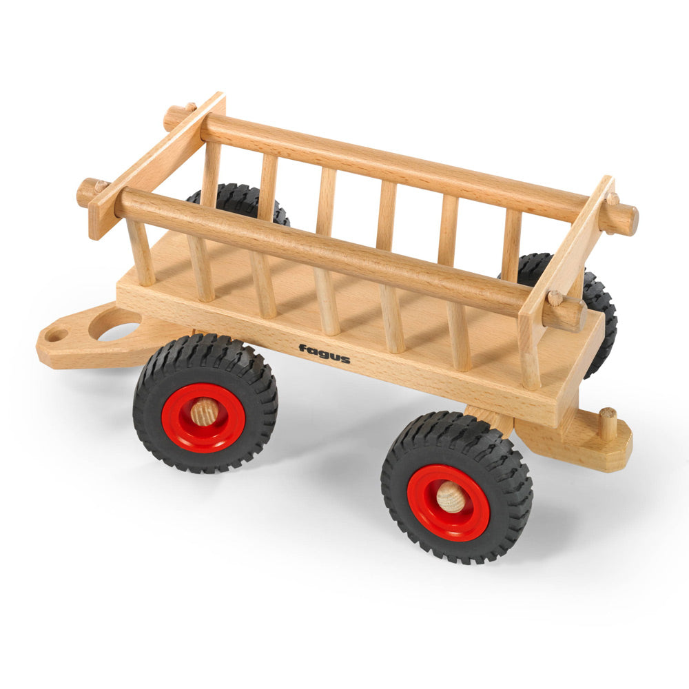 Fagus handmade wooden farm hay wagon toy on a white background