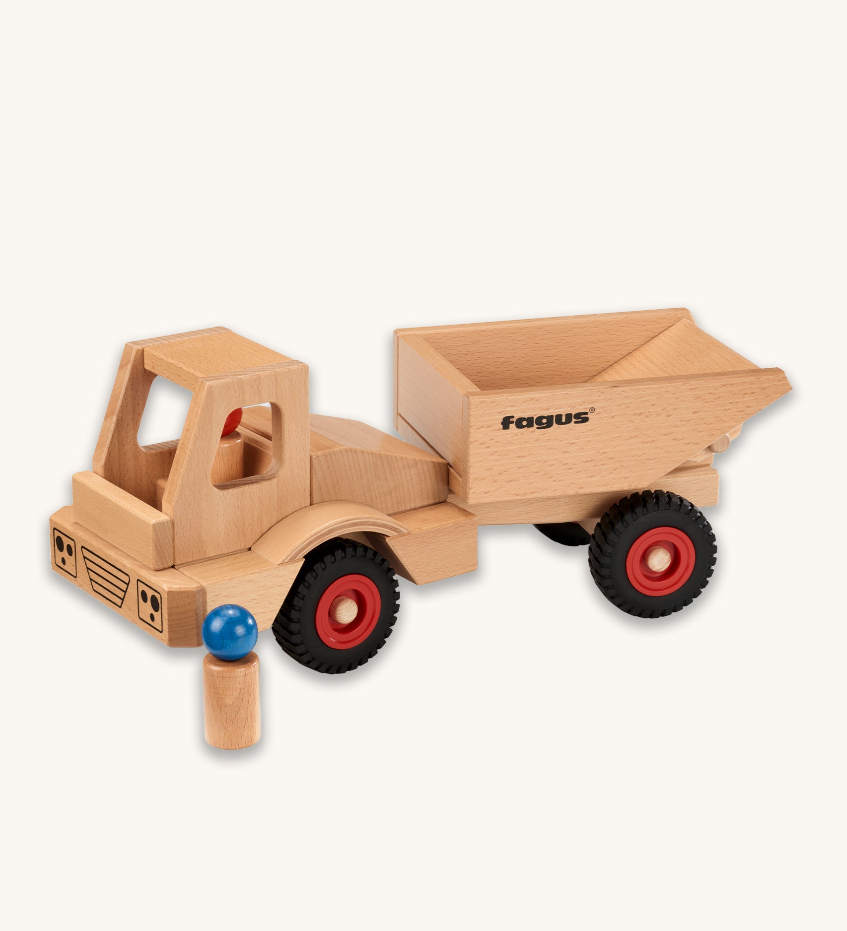 Fagus Wooden Wheels Dumper Truck, with two wooden peg doll figures. One is inside the dumper truck, and one is standing next to the dumper truck