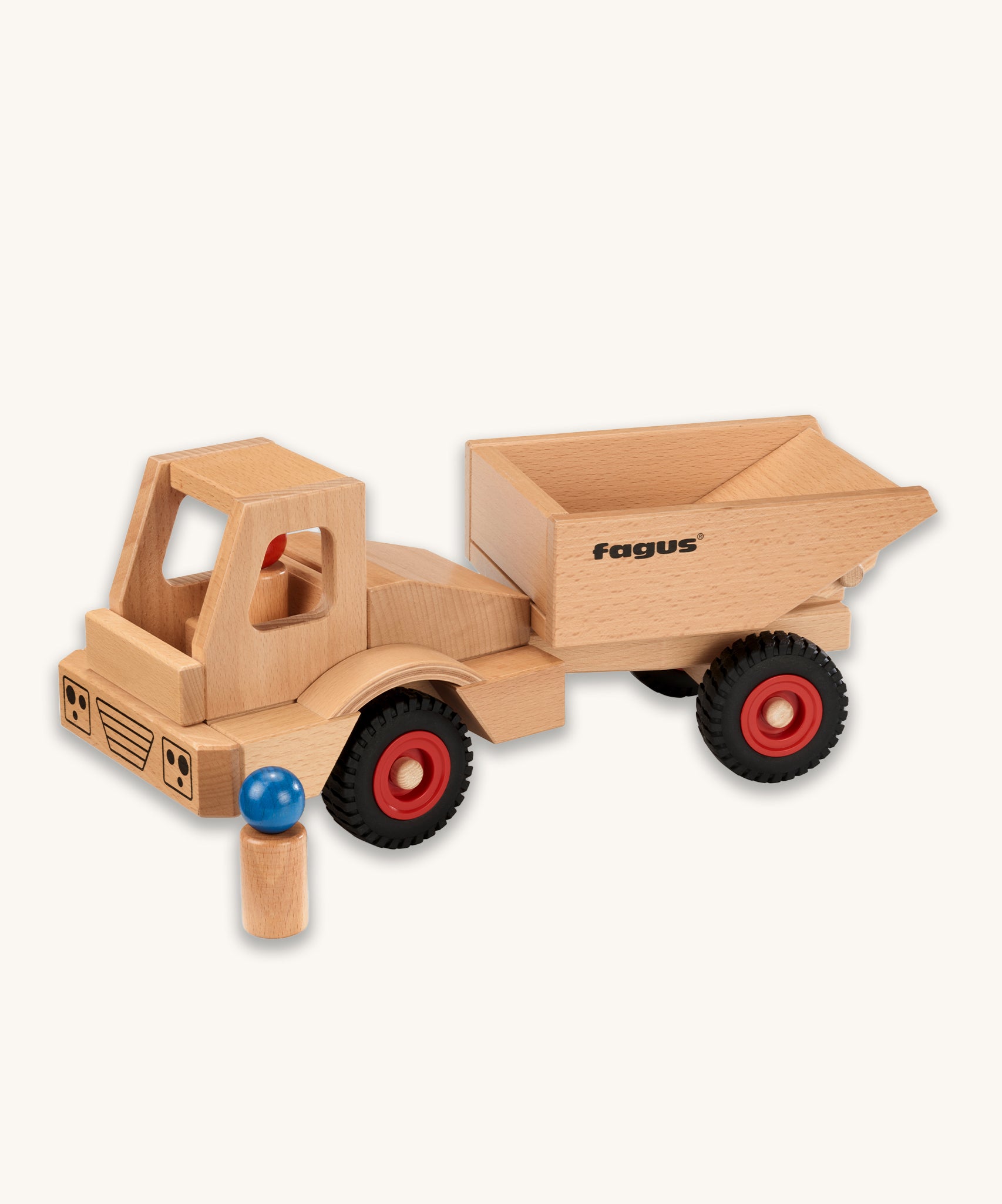 Fagus Wooden Wheels Dumper Truck, with two wooden peg doll figures. One is inside the dumper truck, and one is standing next to the dumper truck