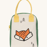 Fluf zip lunch bag in white and green with a design of a fox's head on the bottom with a yellow handle and zip detail on a cream background.