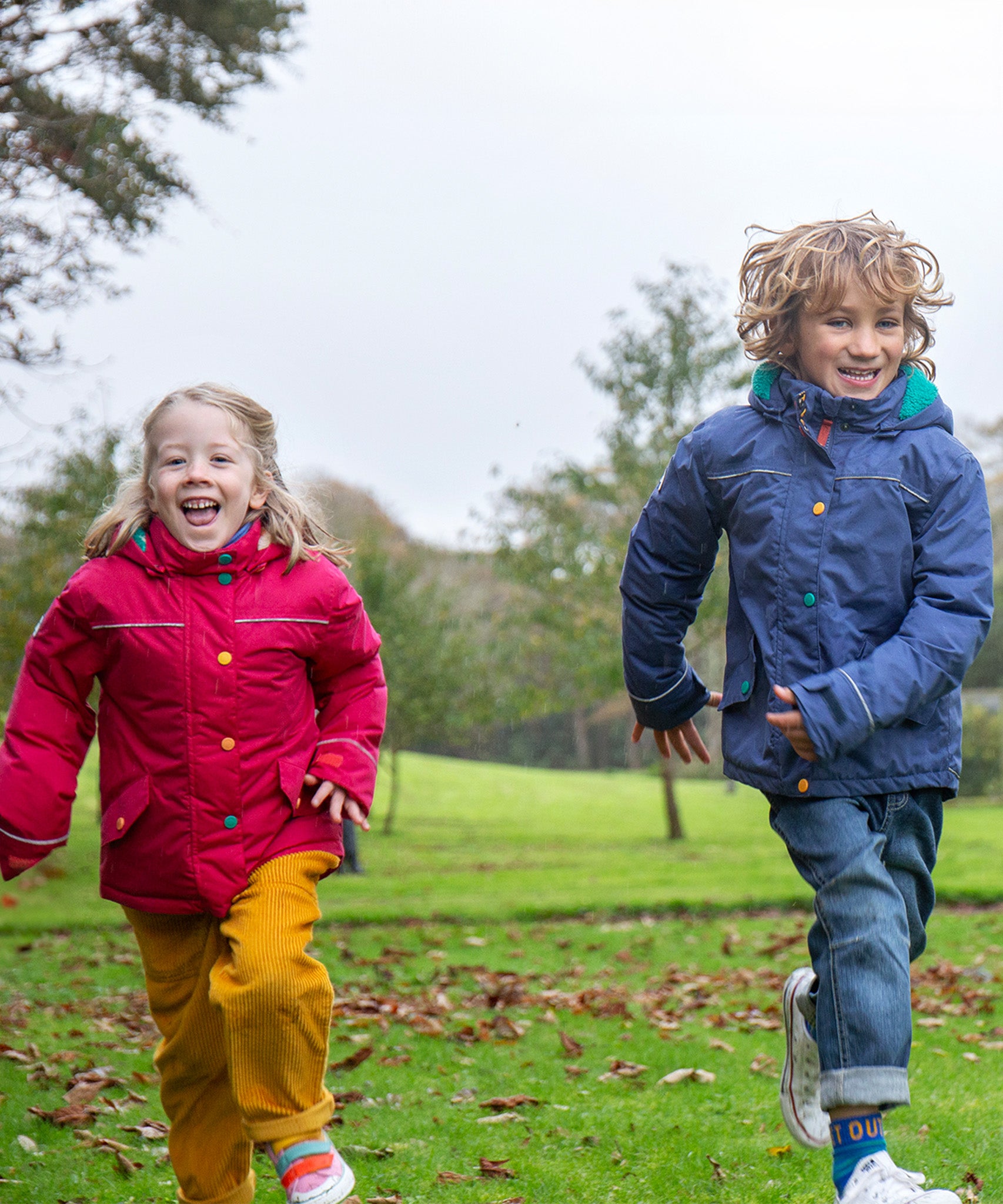 A closer look at the Flower removable gilet on the Frugi Rambler 3 in 1 Coat - Snapdragon/Flower Pop