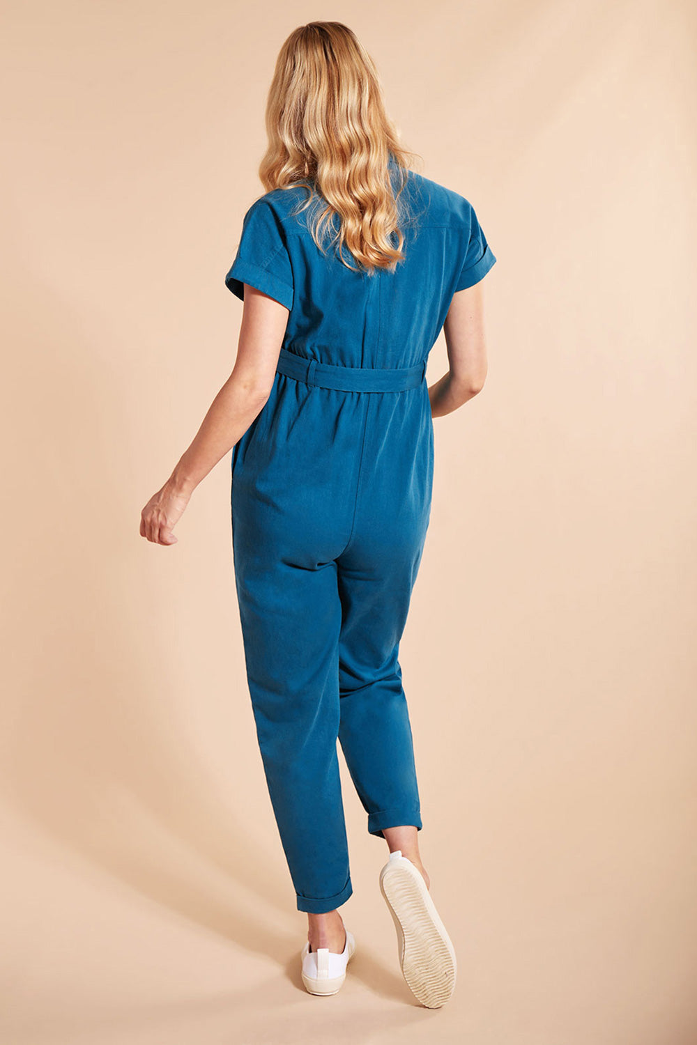 Woman wearing the Frugi Adult deep sea blue coloured Hannah Maternity Jumpsuit showing the back of the outfit