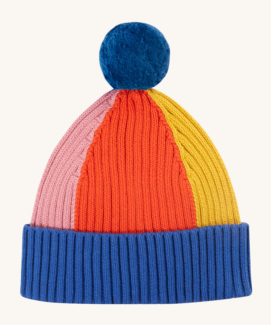 The Frugi Children's Rainbow Rib Bobble Hat - Blue Tang/Rainbow on a cream background