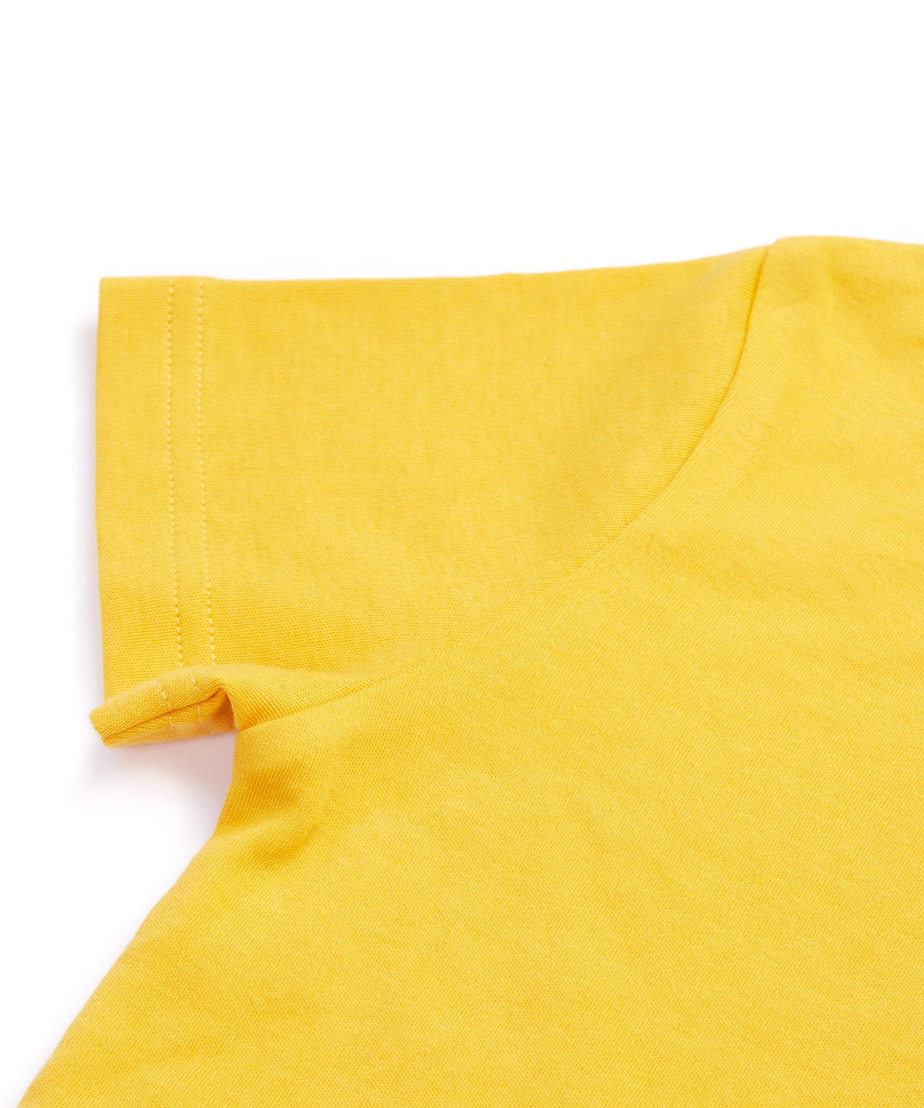 Close up of the Frugi kids bumblebee okapi short sleeve t-shirt. showing the short sleeve detail on yellow organic cotton fabric